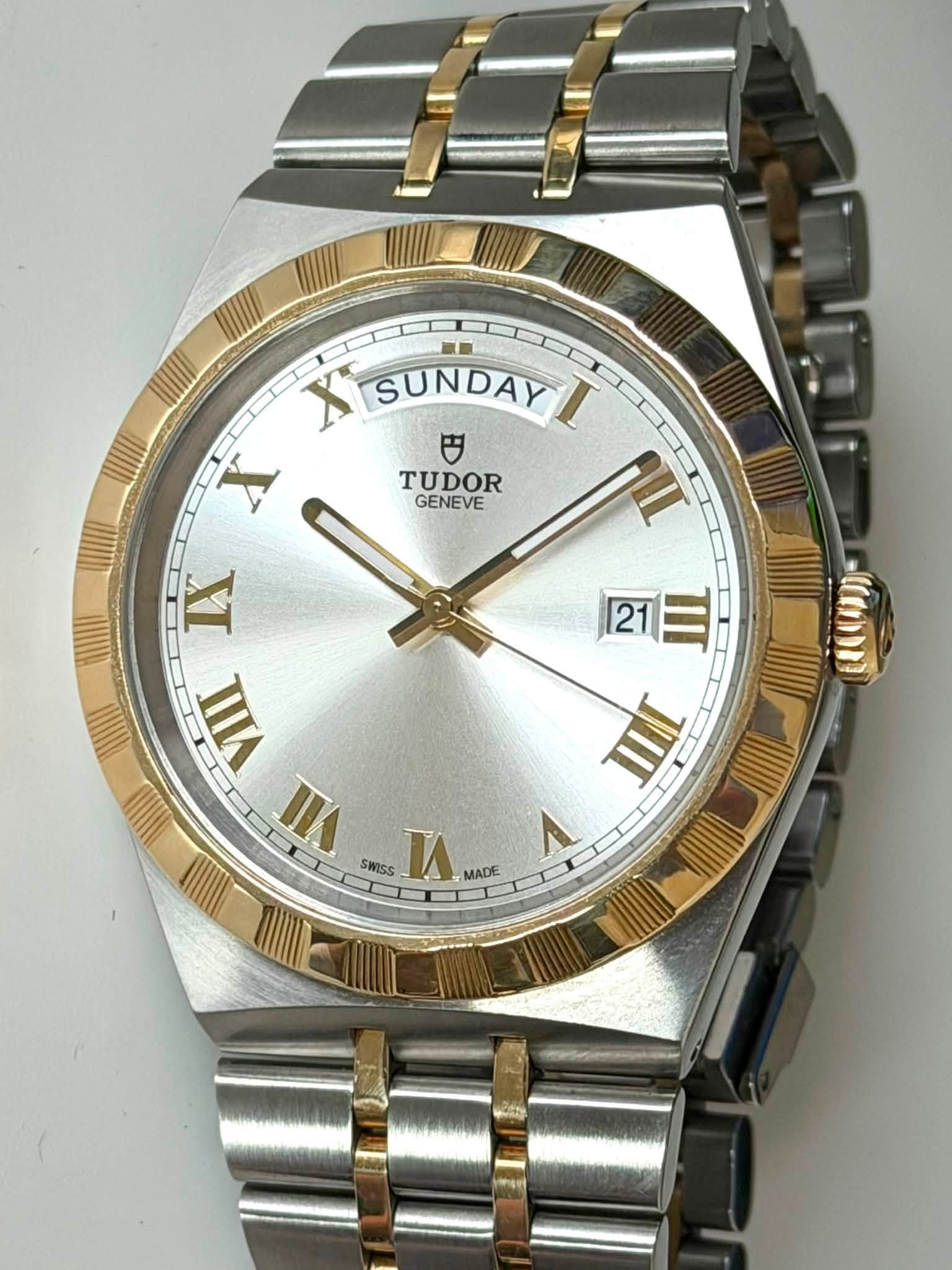 May be an image of wrist watch and text that says 'X SUNDAYI SUNDAY X TUDOR GENEVE XI 21 TIT JII c0 SII SWISS I MADE'