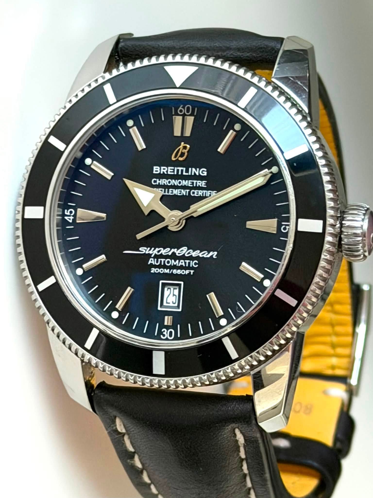May be an image of wrist watch and text that says '60 " お BREITLING CHRONOMETRE CIFLLEMENT CERTIFIE 45 15 superecean AUTOMATIC 200M/ 200M/660FT 660FT I 25 II 30 30 08'