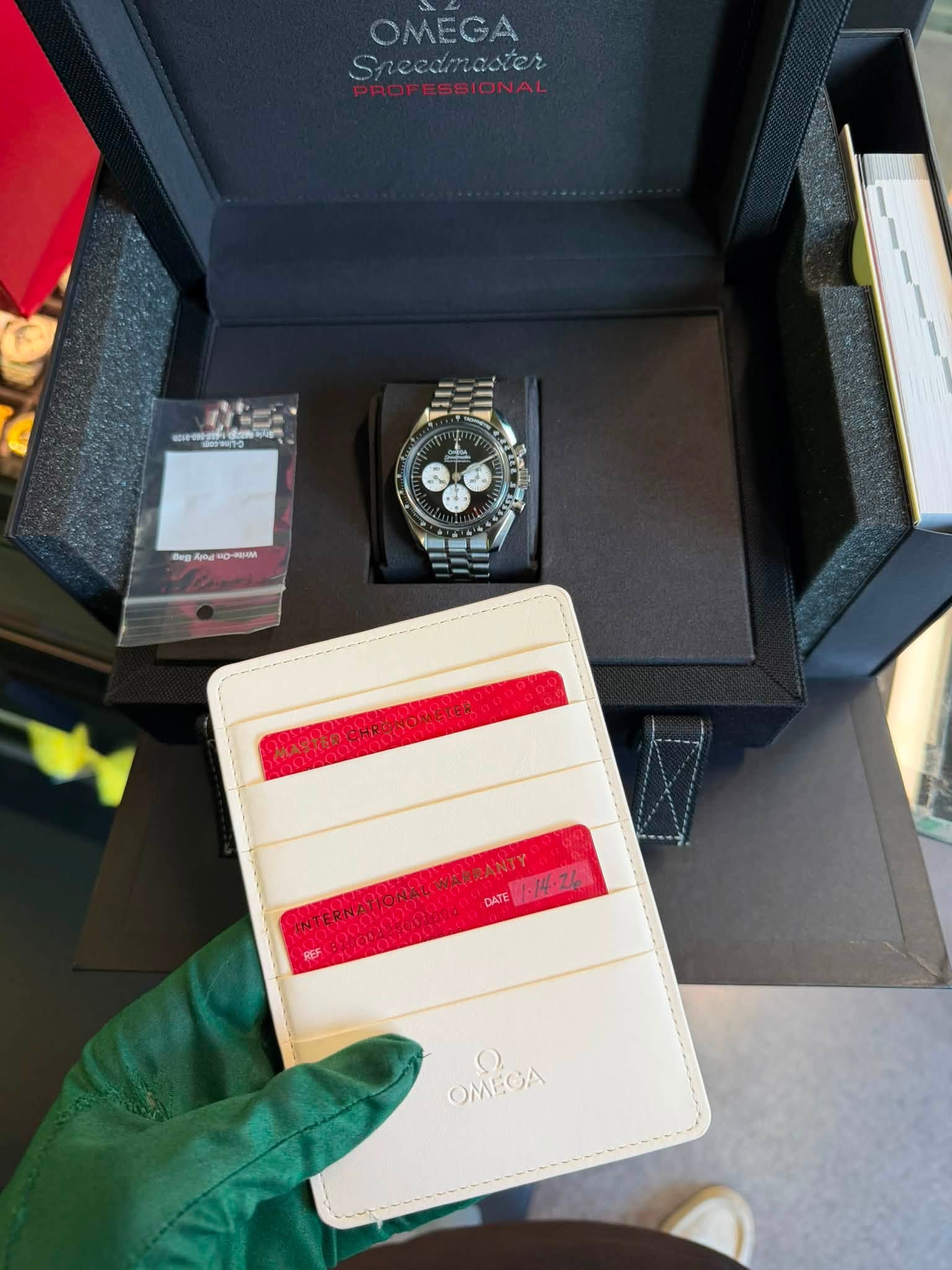 May be an image of wrist watch and text