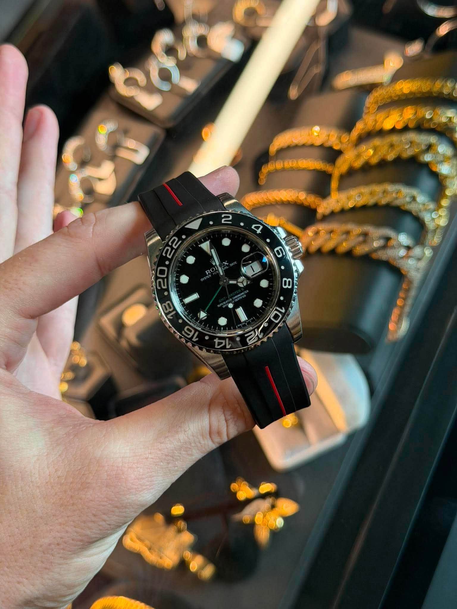 May be an image of wrist watch and text