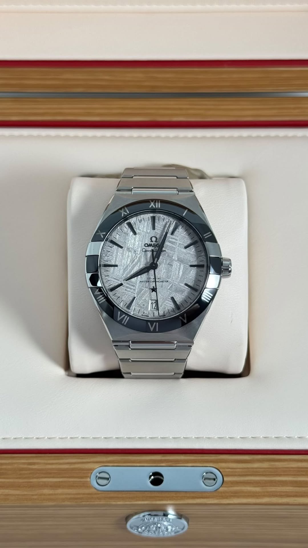 May be an image of wrist watch and text