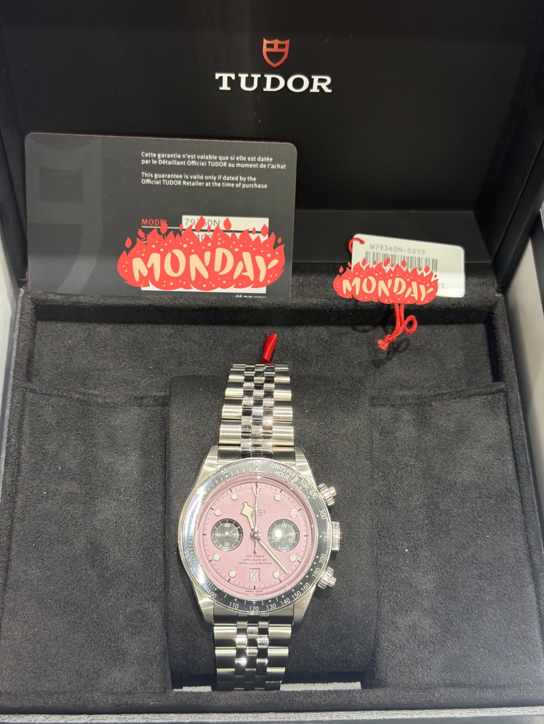 May be an image of wrist watch and text