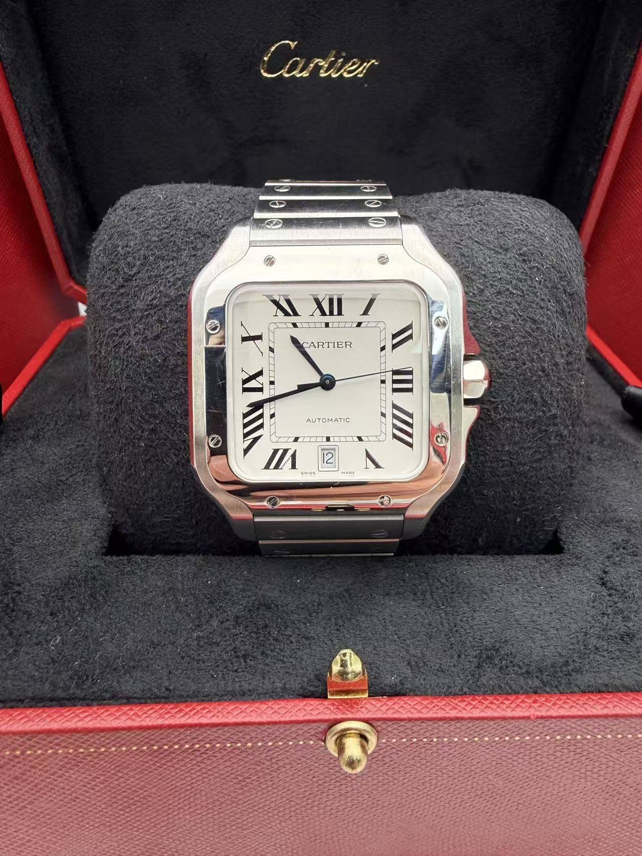 May be an image of wrist watch and text that says 'Ca Cartier صي 3 6 CARTIER XIXII/ I XI XII Q X LE IX O VIII //1 محمد AUTOMATIC 温量 III T C 12 보브'