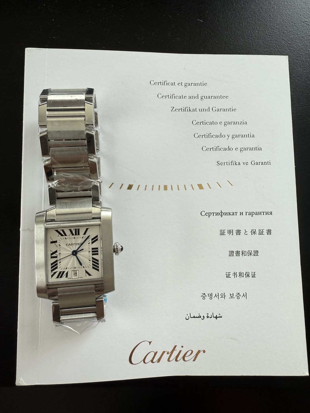 May be an image of wrist watch and text that says 'Certificat Certificatelgarantie et L garantic Certificate Certificateamiguarantee HHH! guarantee Zertifikat und Garantie…