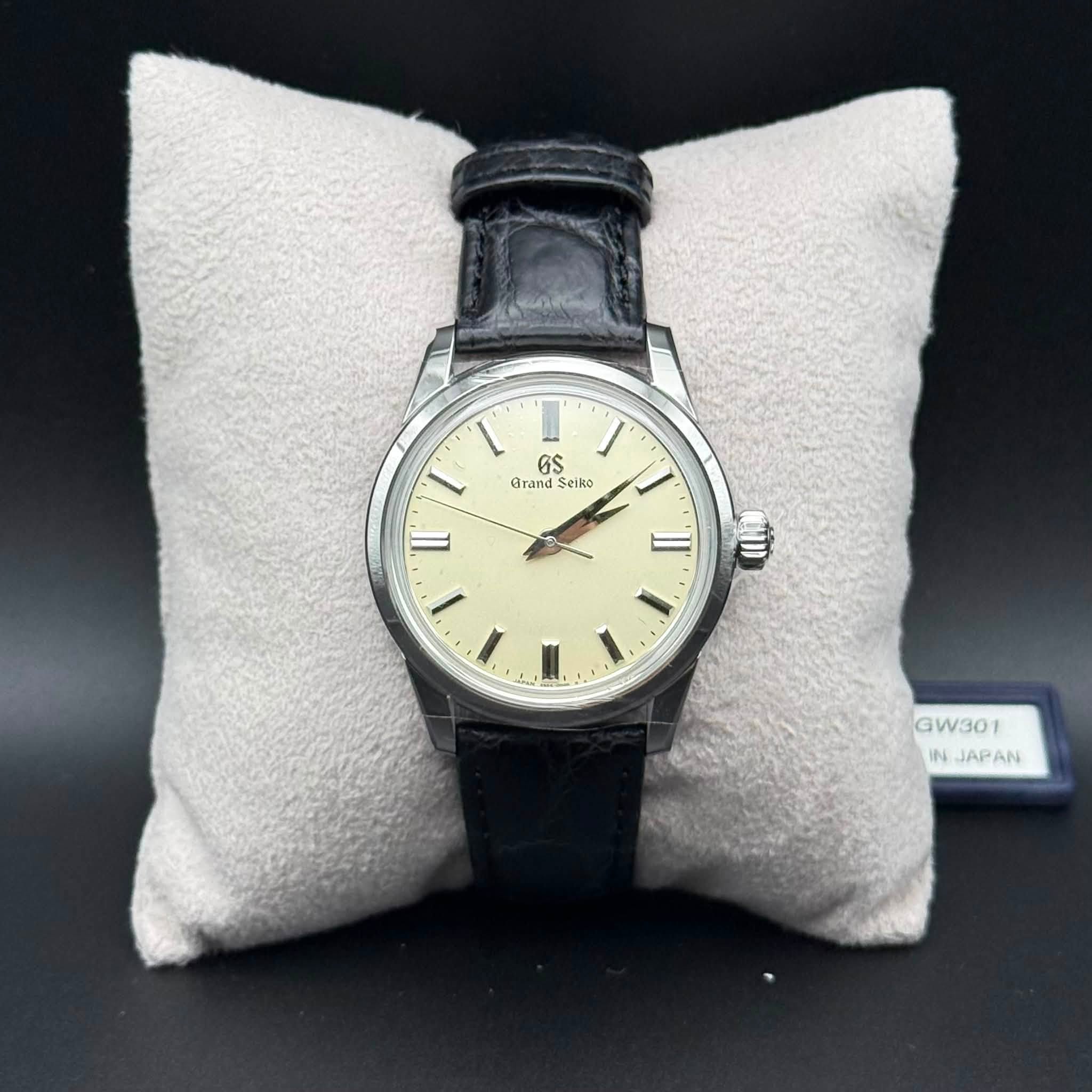May be an image of wrist watch and text that says '6S S Grand Seilo 1 II TI 佟 GW301 IN JAPAN INJAPAN AN'
