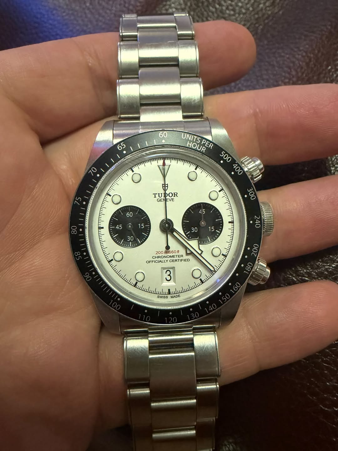 May be an image of wrist watch and text