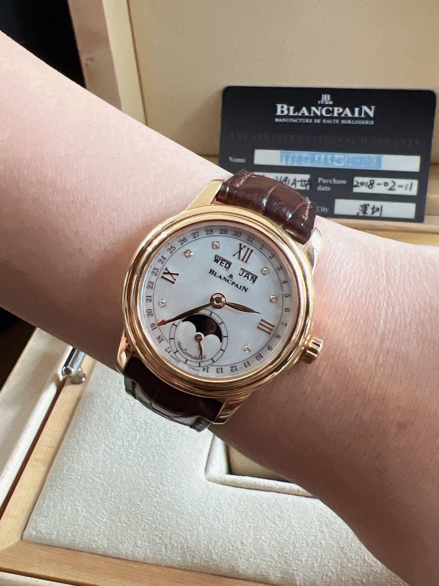 May be an image of wrist watch and text