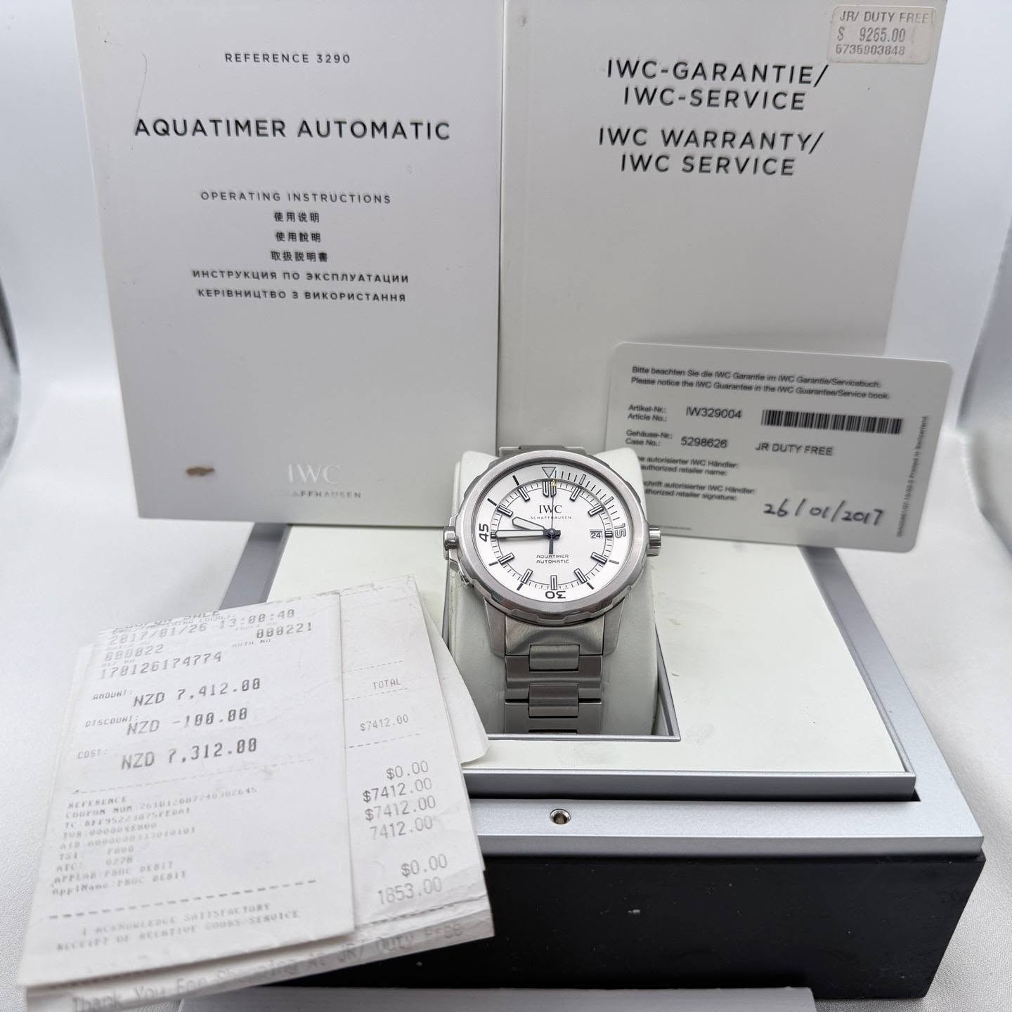 May be an image of wrist watch and text that says 'REFERENCE 3290 AQUATIMER AUTOMATIC JA/ DUTY FRFF IWC-GARANTIE/ IWC IWC-SERVICE IWC WARRANTY/ IWC SERVICE OPERATING…