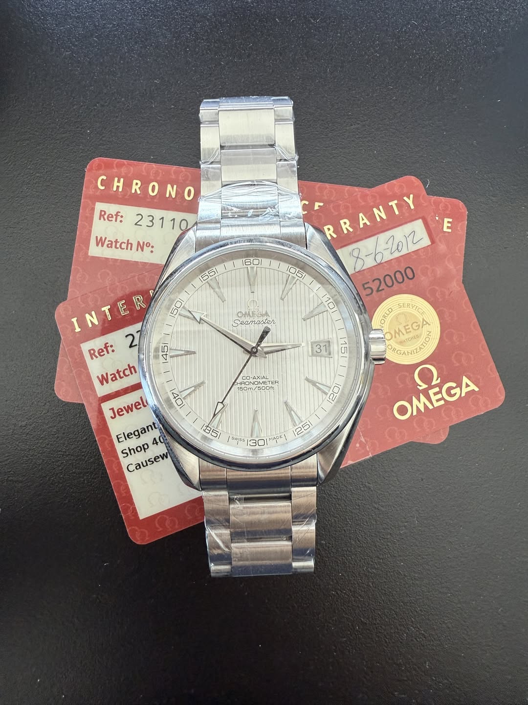 May be an image of wrist watch and text