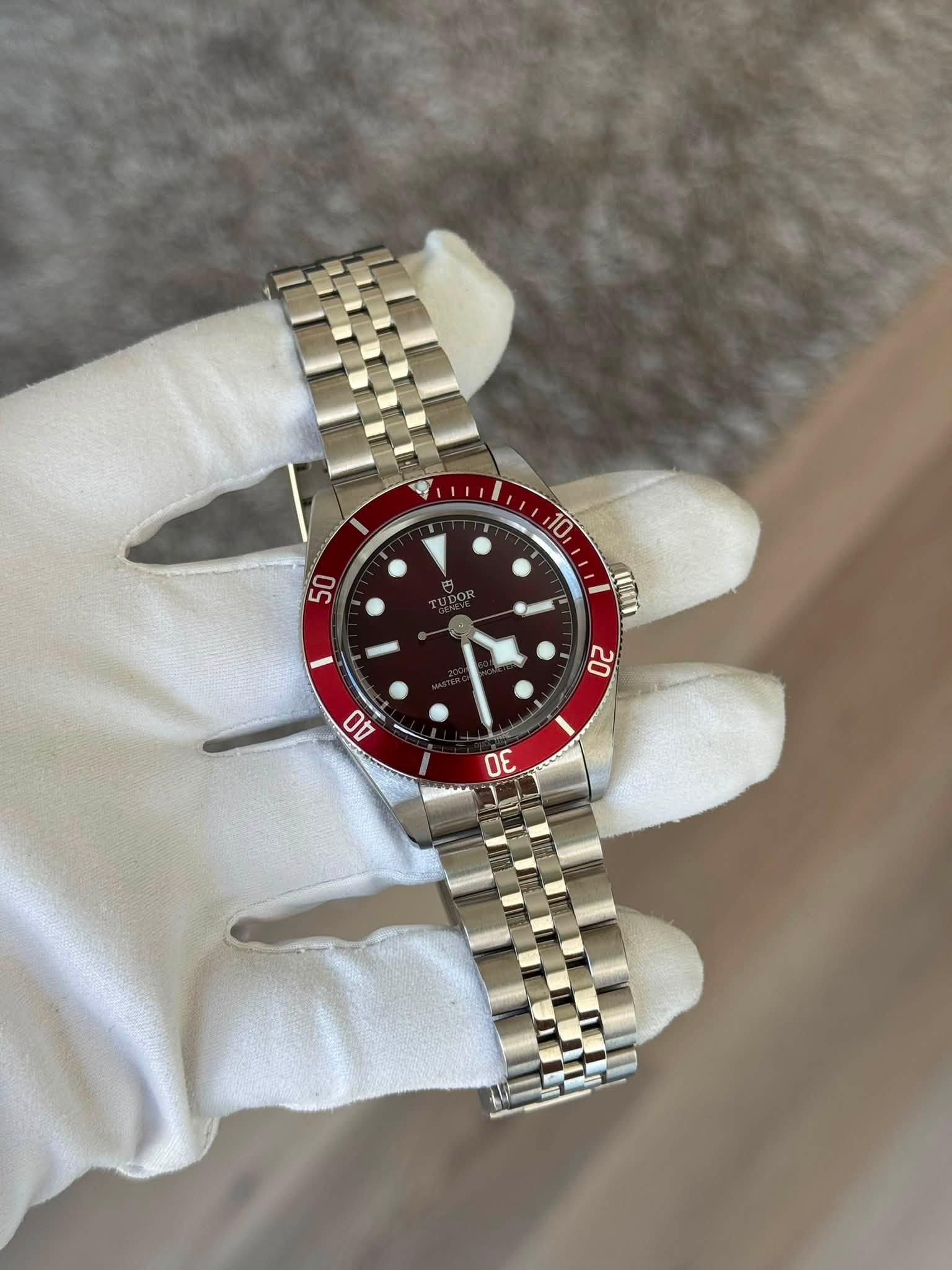May be an image of wrist watch and text