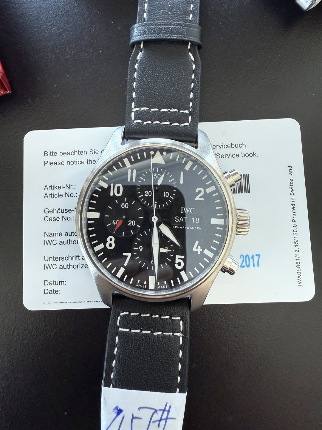 May be an image of wrist watch and text that says 'Bitte beachten Sie Please nt the ervicebuch. Service book. Artikel-Nr.: Article No.: 30 I1 10 20 10. Gehäuse-r Case No.: 60 4 20…