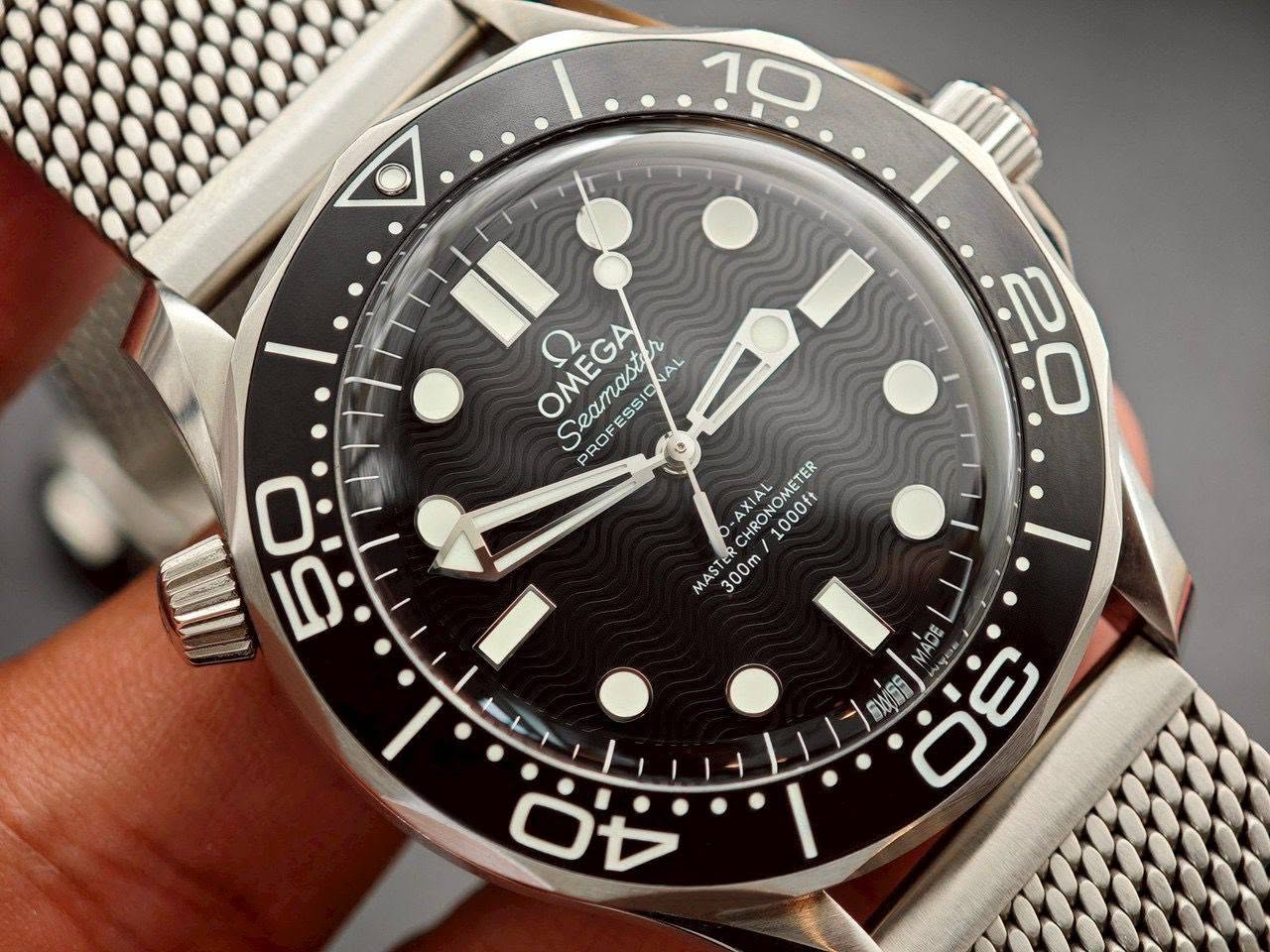 May be an image of wrist watch and text that says '10 OMEGA Seamaster Seea FESSIC PROF PROFESS PROFESSICNAL sS SIONAL AL -AXIA CHRONOMETER CHRONOMET 1000ft MASTER 300m 20 公 ٥…
