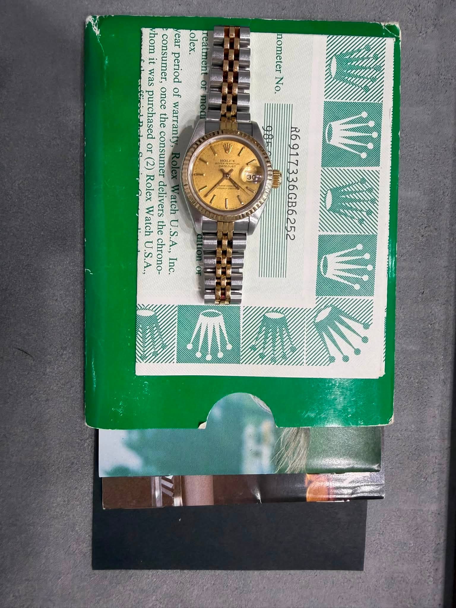 May be an image of wrist watch and text that says 'عمم whom year Lolex. it was consumer, ផីទ 님성 period purchased once neerchan of the warrant (2) r(2) or consumer MTEST Rolex 소…
