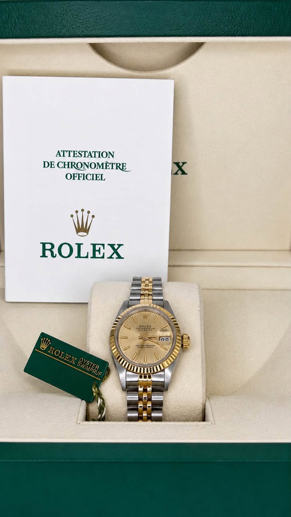 May be an image of wrist watch and text