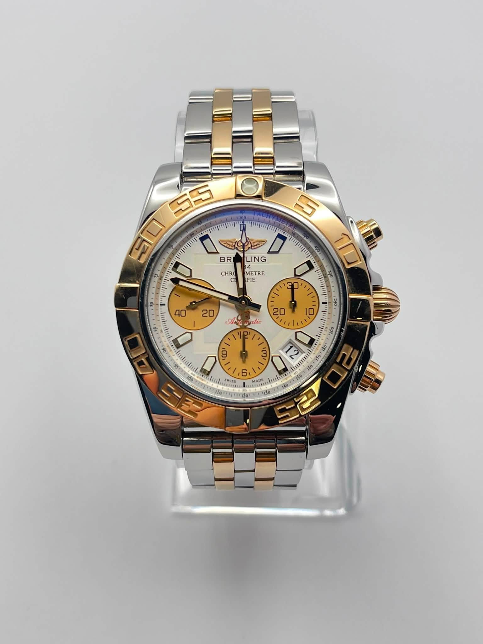 May be an image of wrist watch and text