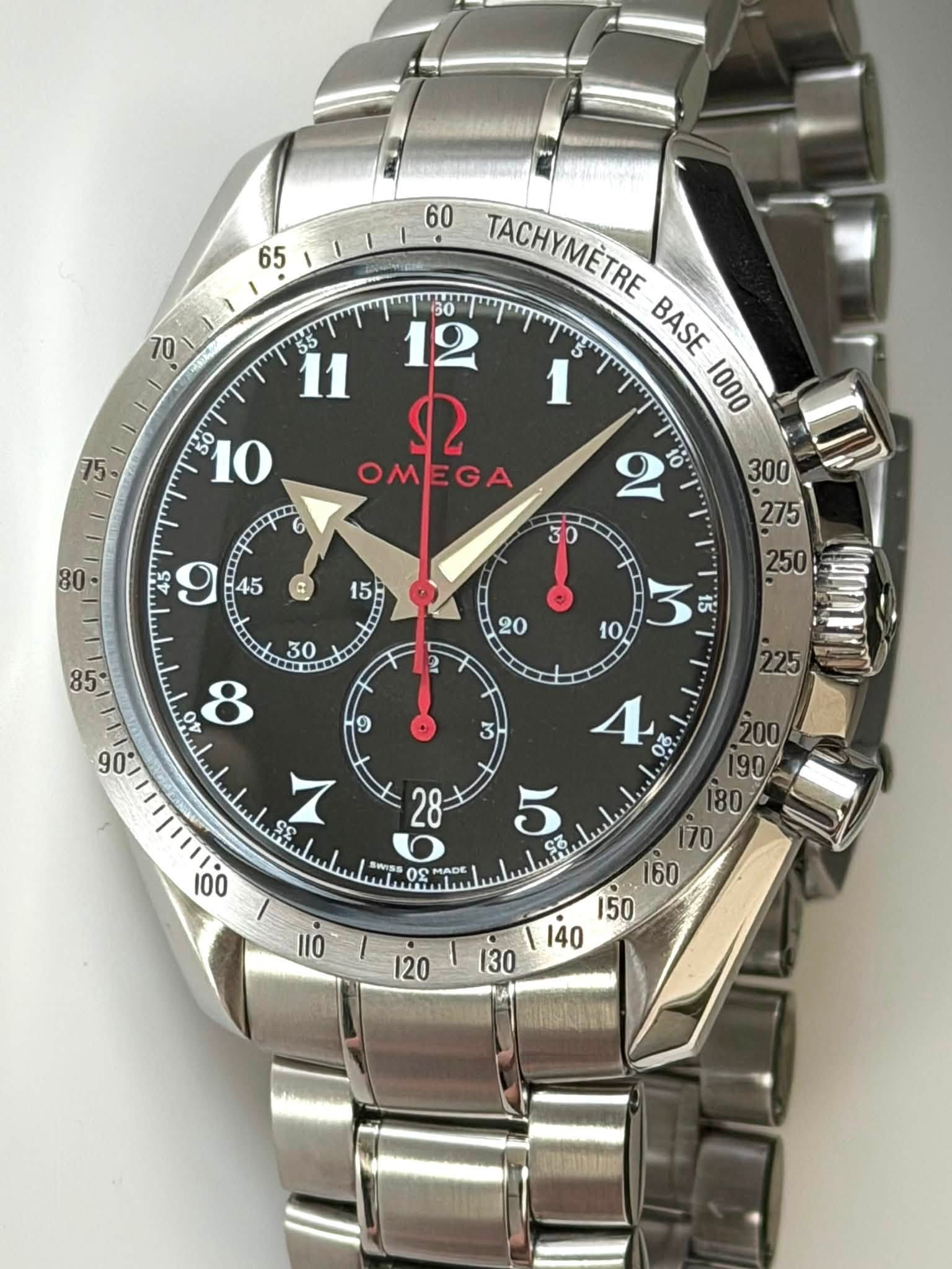 May be an image of wrist watch and text that says ' TACHYMETRE 12 5 BASE 1 2 1000 OMEGA GA OME எ CO 45 = ဟ 30 20 10 L 诺 8 90 9 3 ና. 28 Z 0 5 S8 100 日内使 ዐደ MADE I '