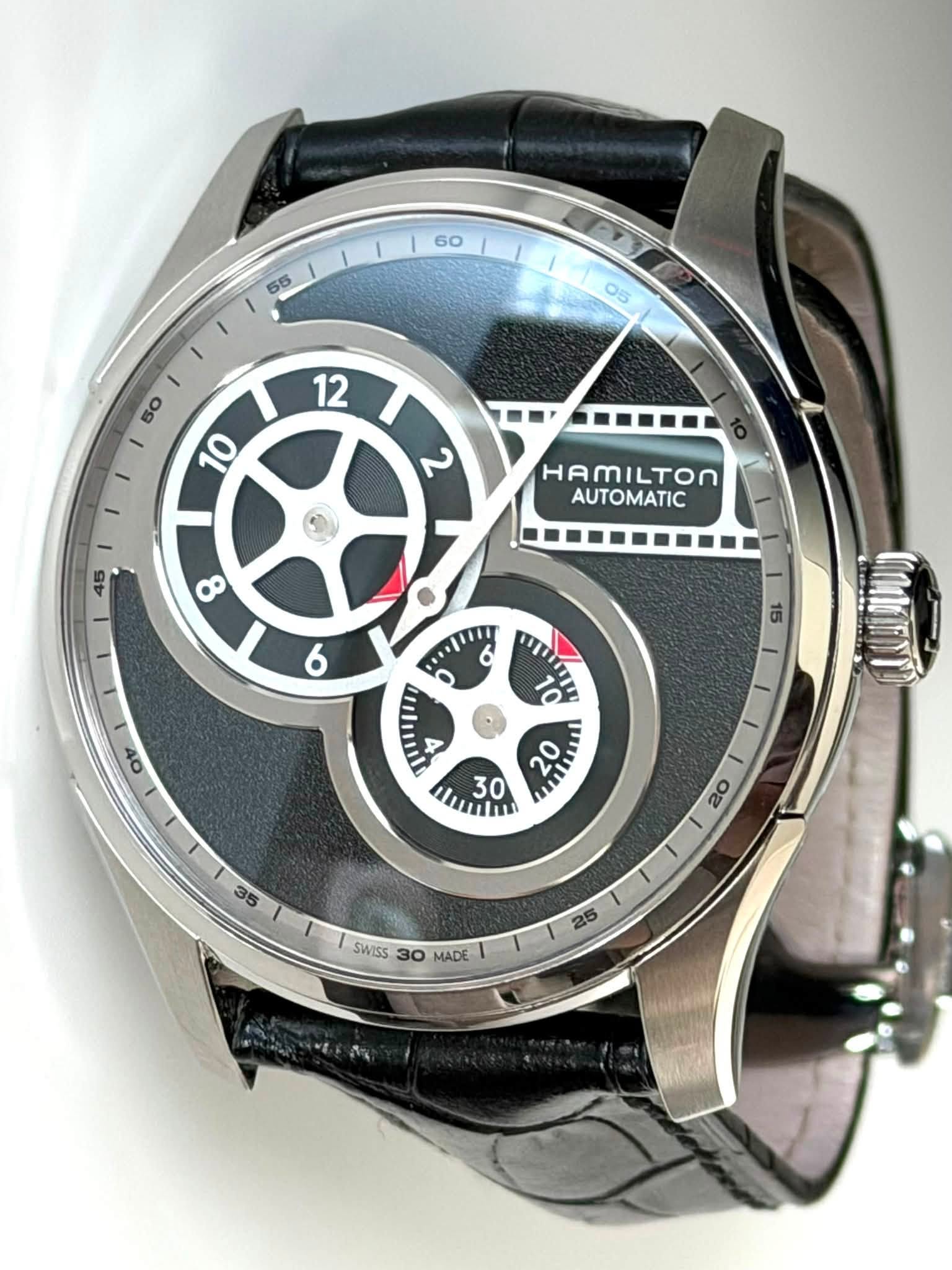 May be an image of wrist watch and text that says ' م 45 HAMILTON AUTOMATIC 8 6 6 OF 10 nau 4 MMITYT 20 30 umI I 20 35 SWISS 30 MADE 25'