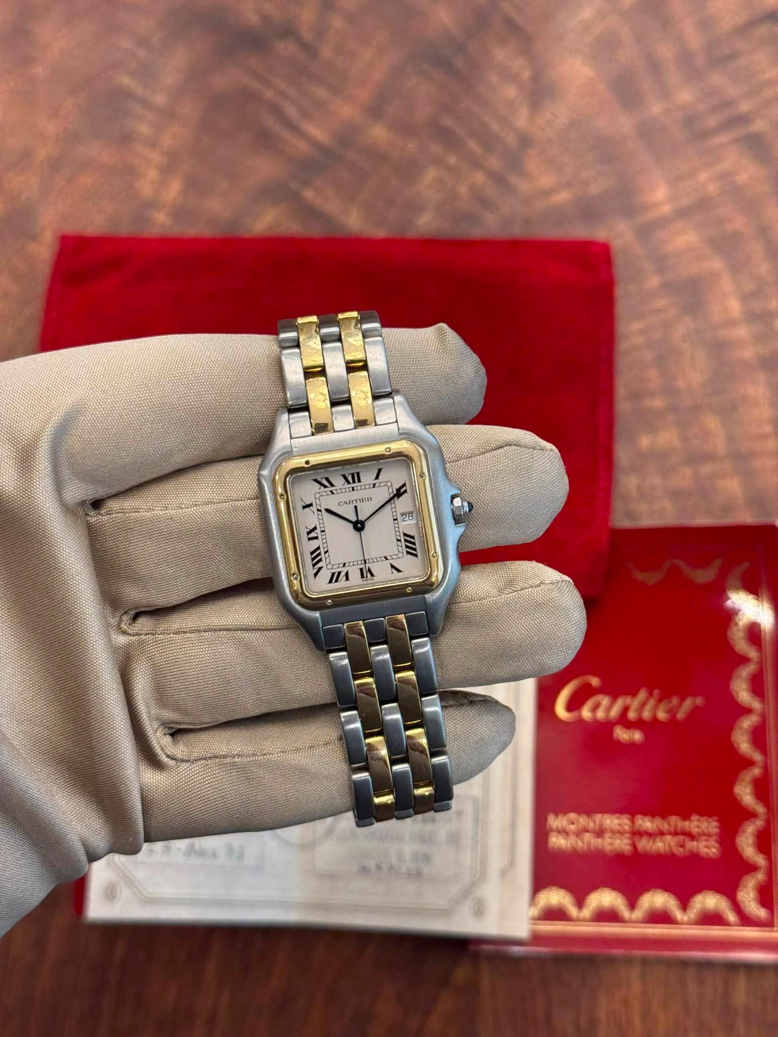 May be an image of wrist watch and text