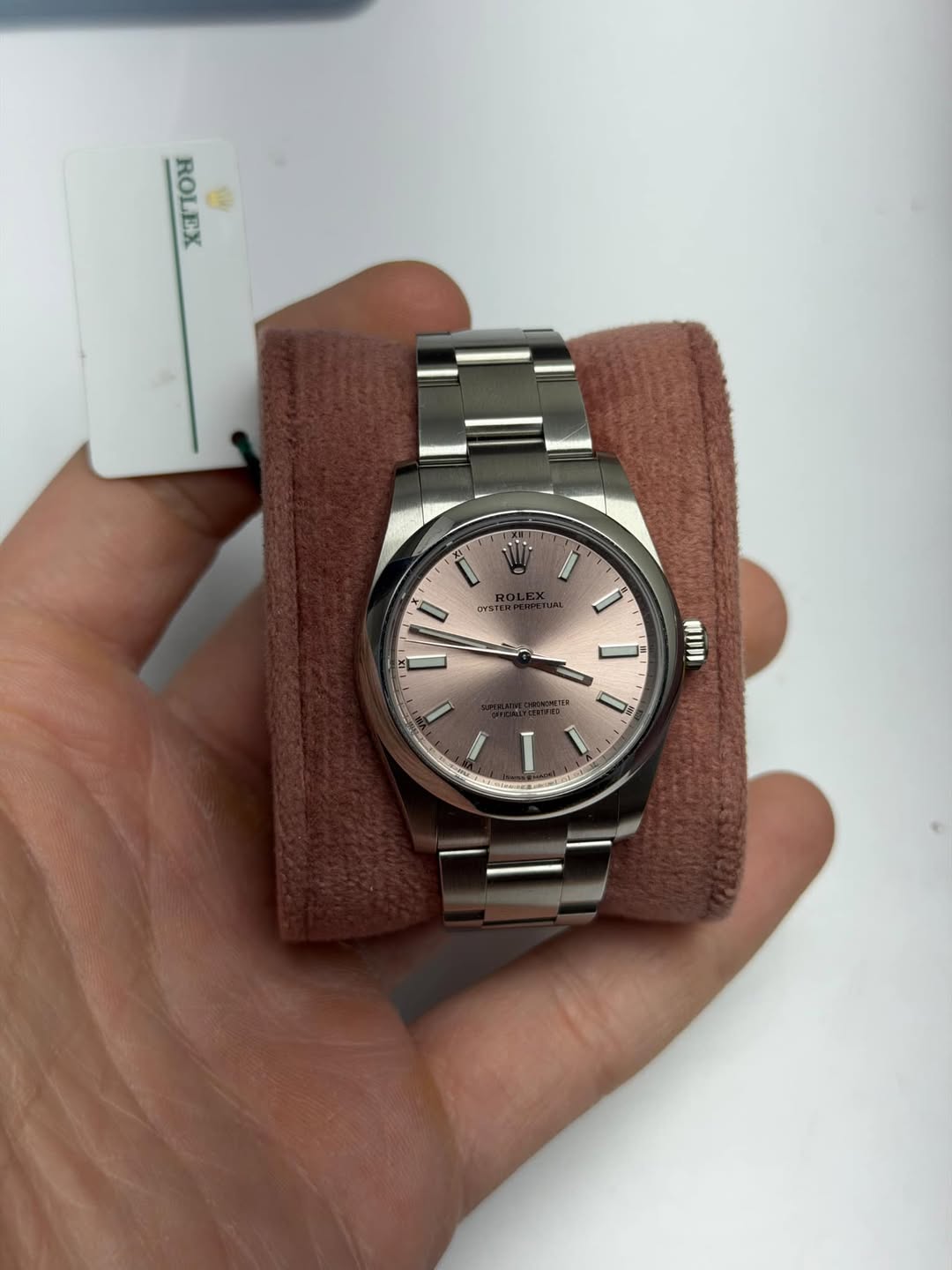 May be an image of wrist watch and text