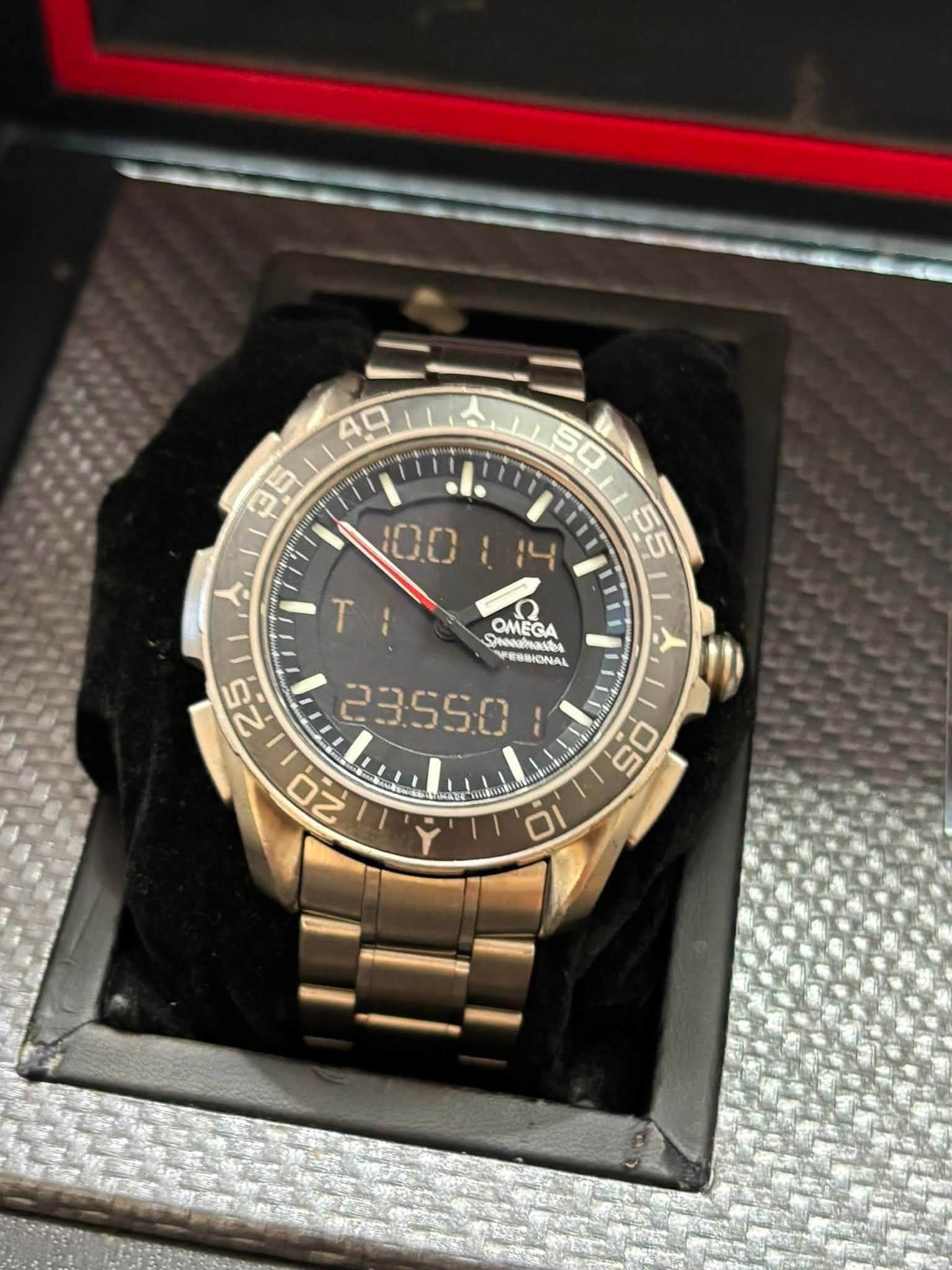 May be an image of wrist watch and text
