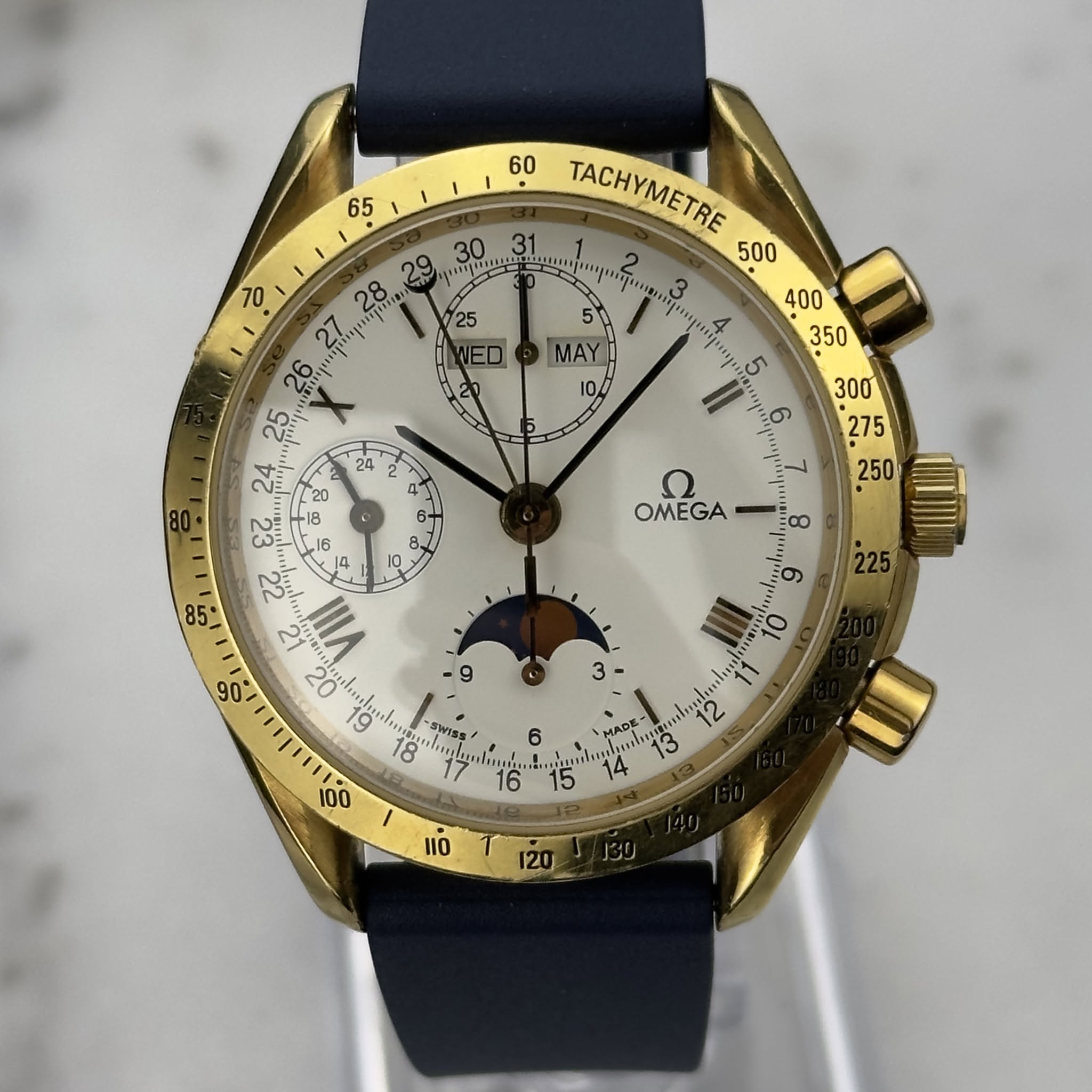 May be an image of wrist watch and text