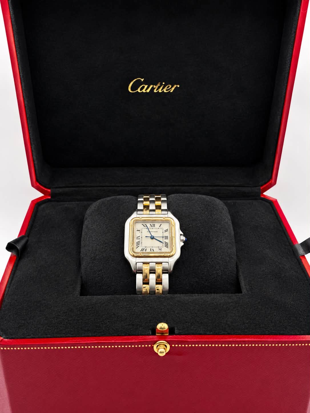 May be an image of wrist watch and text that says 'Cartier II II 11 N'