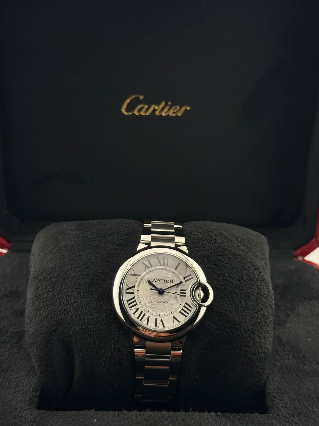 May be an image of wrist watch and text