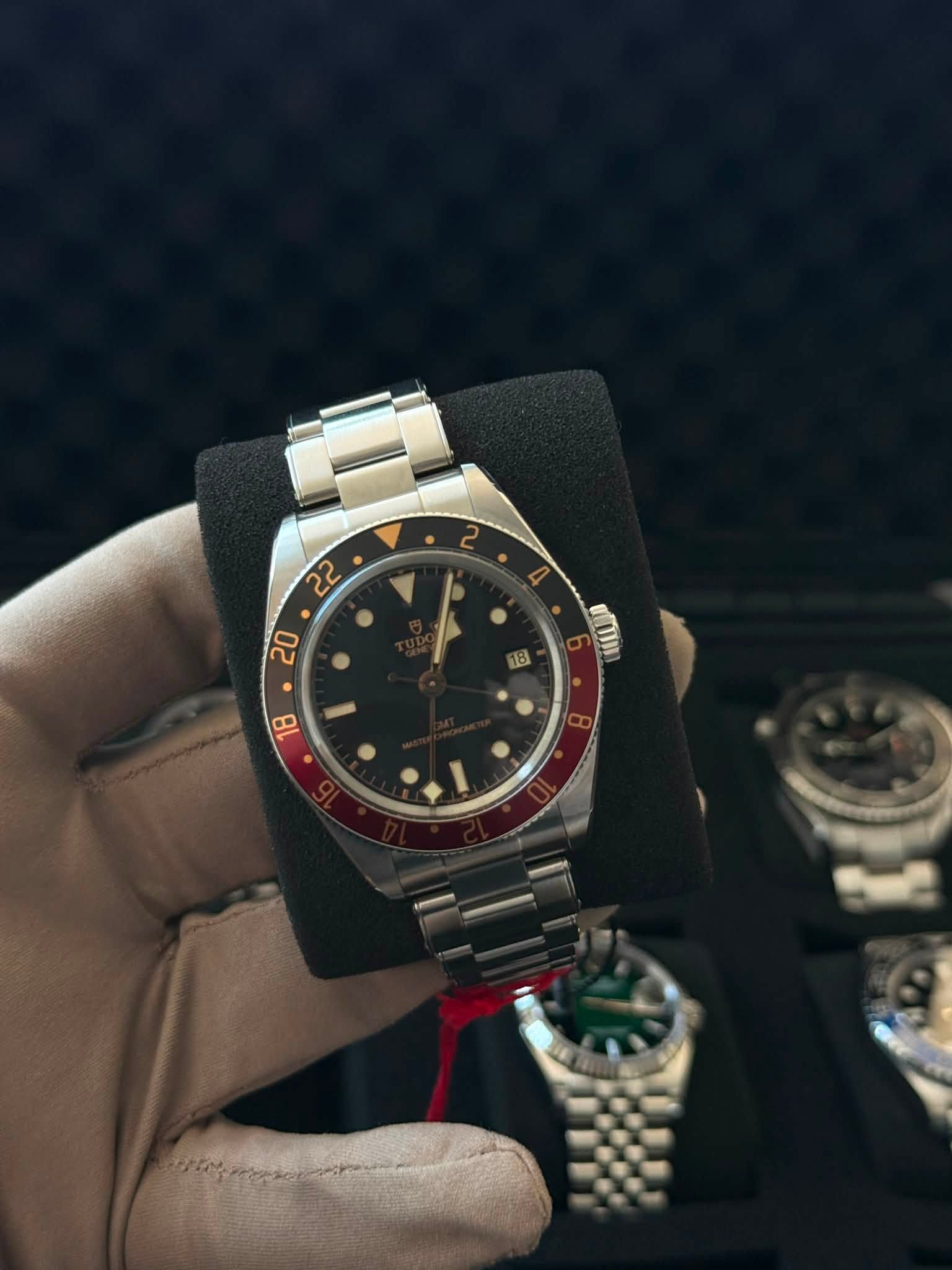 May be an image of wrist watch and text