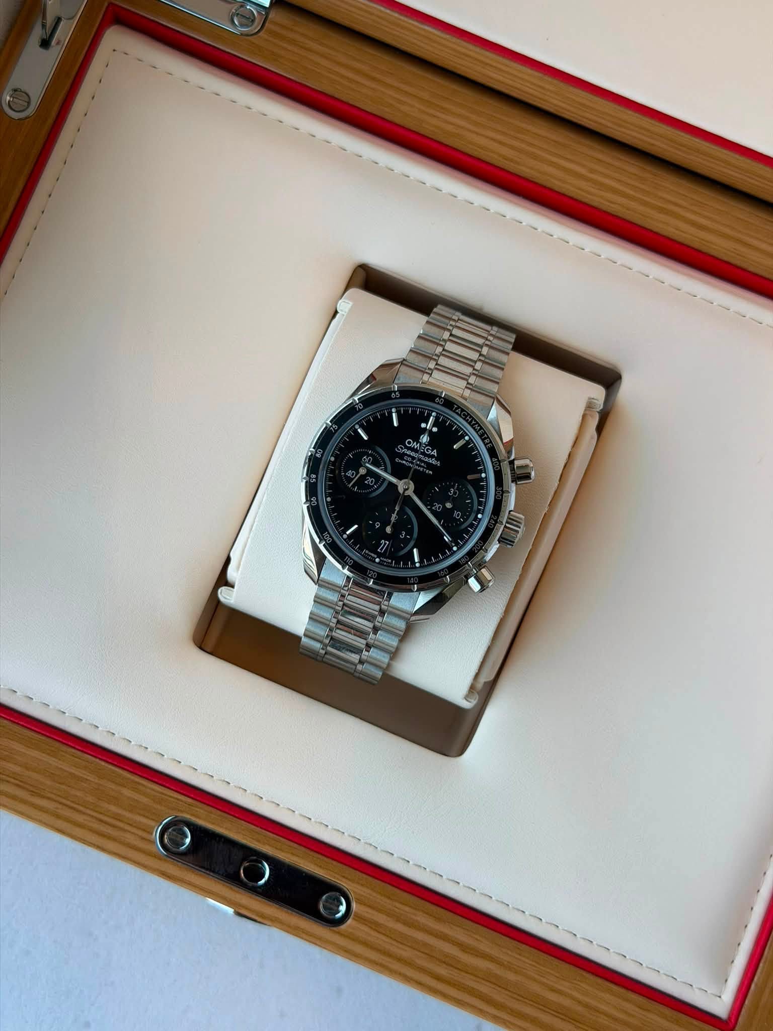 May be an image of wrist watch and text