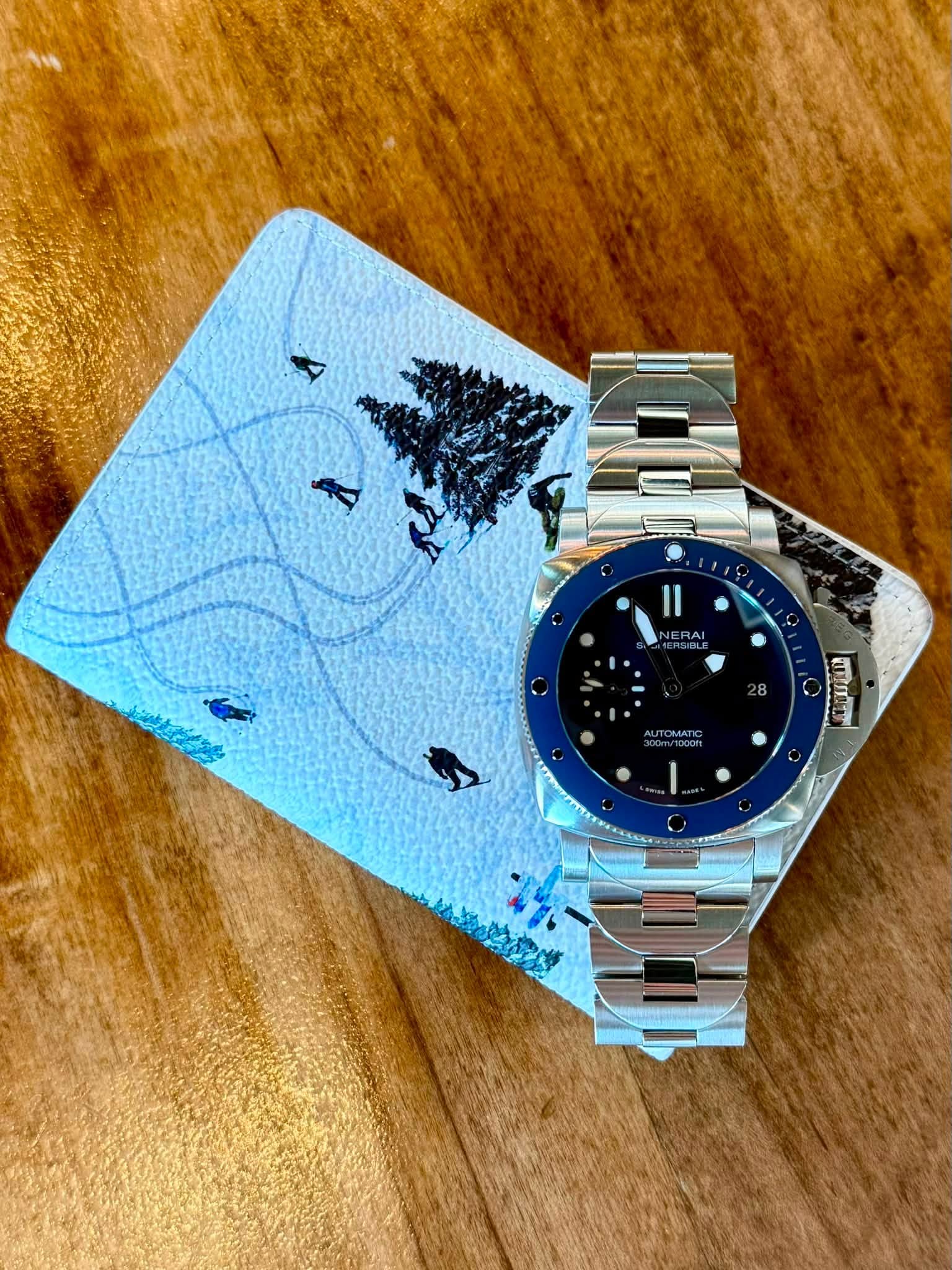 May be an image of wrist watch, map and text