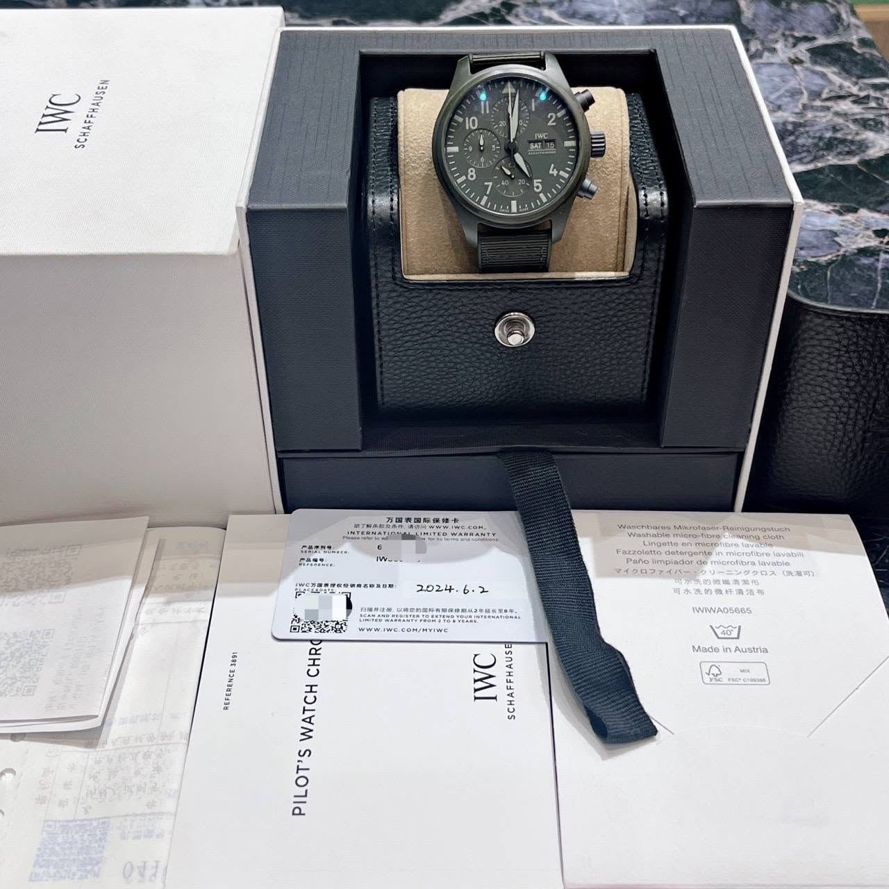 May be an image of wrist watch and text