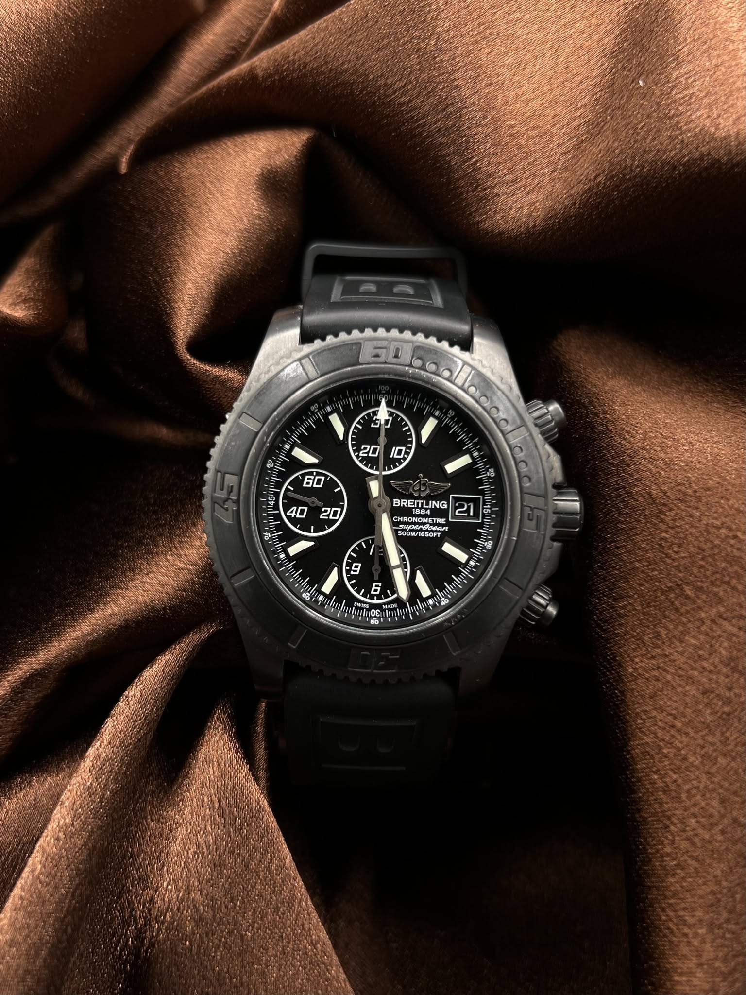 May be an image of wrist watch and text