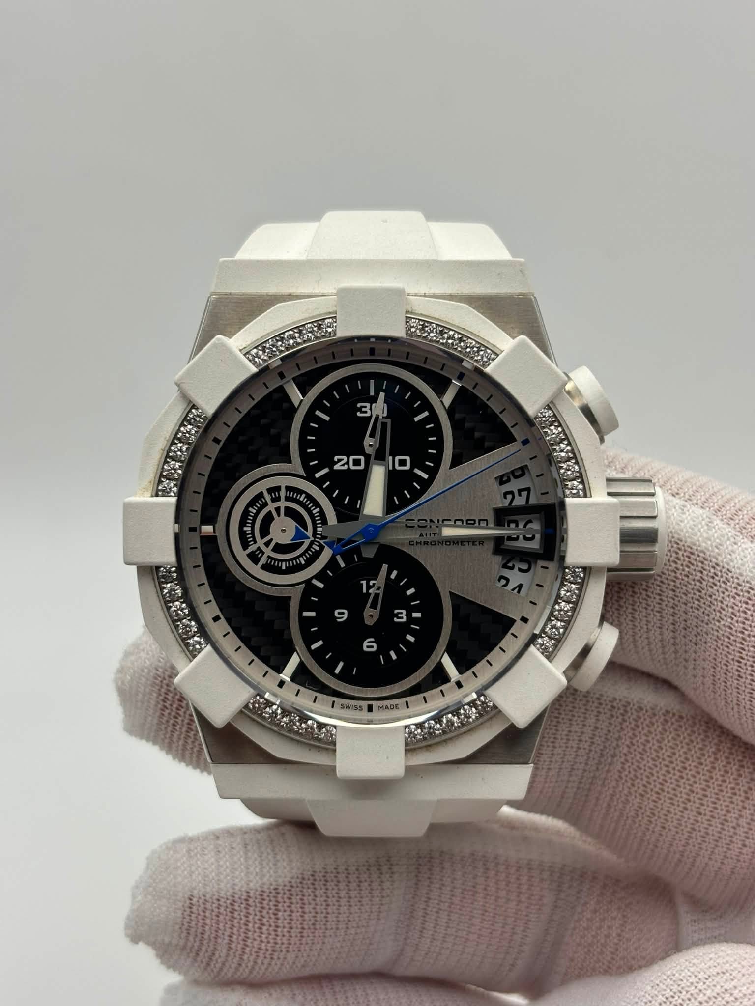 May be an image of wrist watch and text