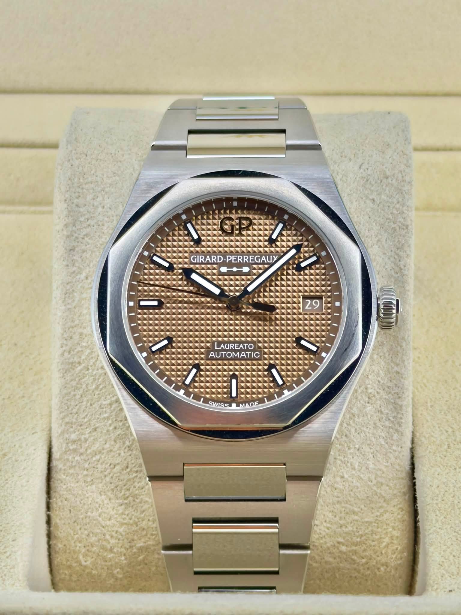 May be an image of wrist watch and text that says 'OEy ANTC M GIRARD PERREGAUY GIRARD-PERREGAUY PERR 29 LAUREATO AUTOMATIC « WES MADE'
