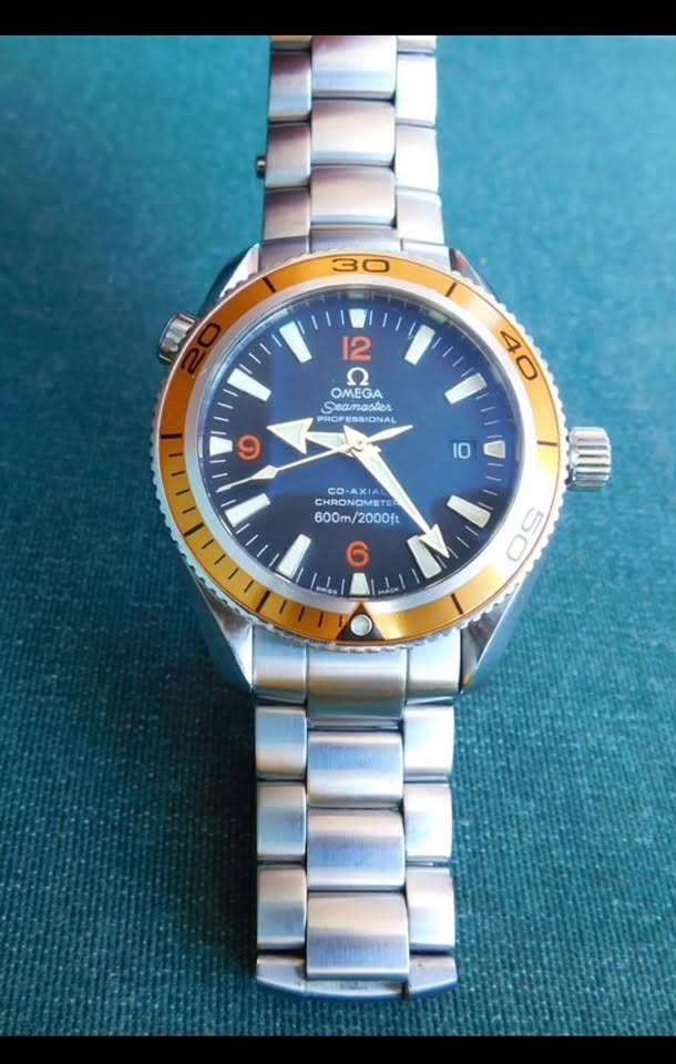 May be an image of wrist watch and text that says '30 12 2 Seamaster SSIONAL SSION သပ် OMEGA Seamaste SSIO 40 O 4 و 10 CHRONOM CHRONOME CHR Cлa CHRONOMSTE cO NOMET 600m/2000f…