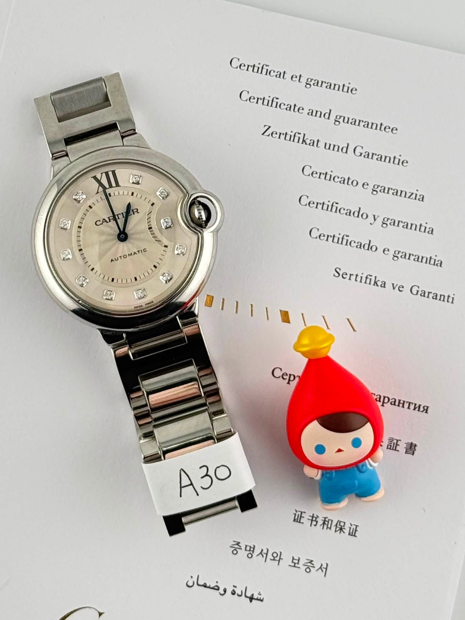 May be an image of wrist watch and text that says 'XII সে 2내회용 ร 15 CAR Certificat et garantie Certificate and guarantee Zertifikat und Garantie Certicato e garanzia…