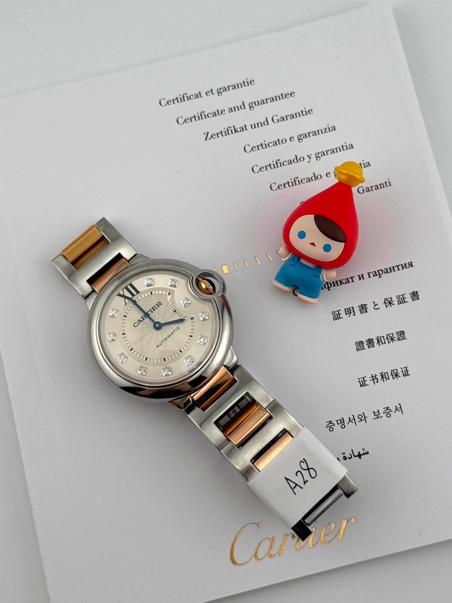 May be an image of digital watch and text that says 'Certificat et garantie Certificate and guarantee Zertifikat und Garantie Certicato e garanzia Certificadoy Certificado e…