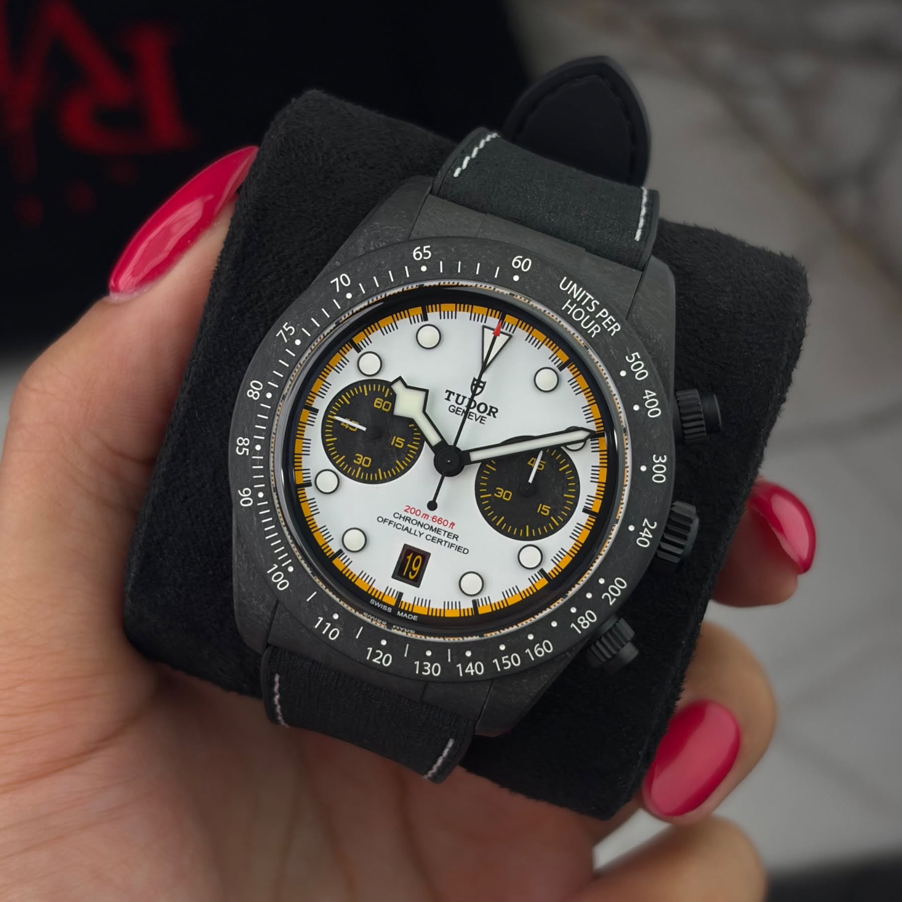 May be an image of digital watch and text