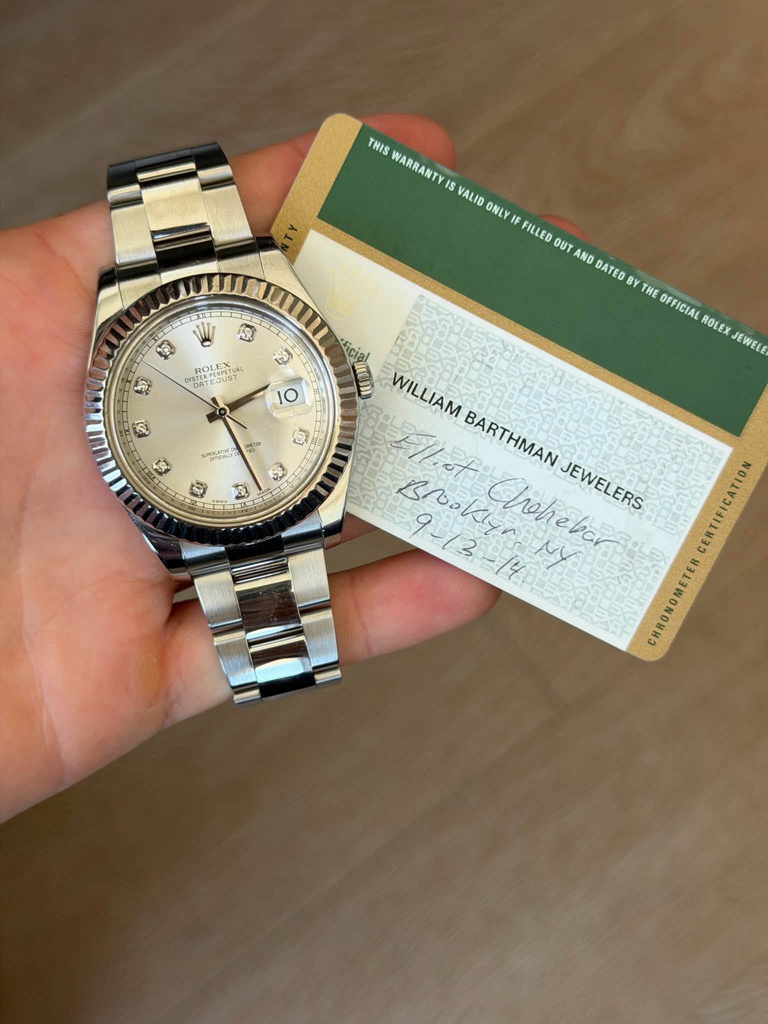 May be an image of wrist watch and text that says 'THIS WARRANTY IS IS VALID ONLY IF FILLED ย AND DATED BY YT THE OFFICIAL ROLEX JEWELE ่ D 短 ROLEX EPESPETCA SPETUAL ឡ SYSTEA…