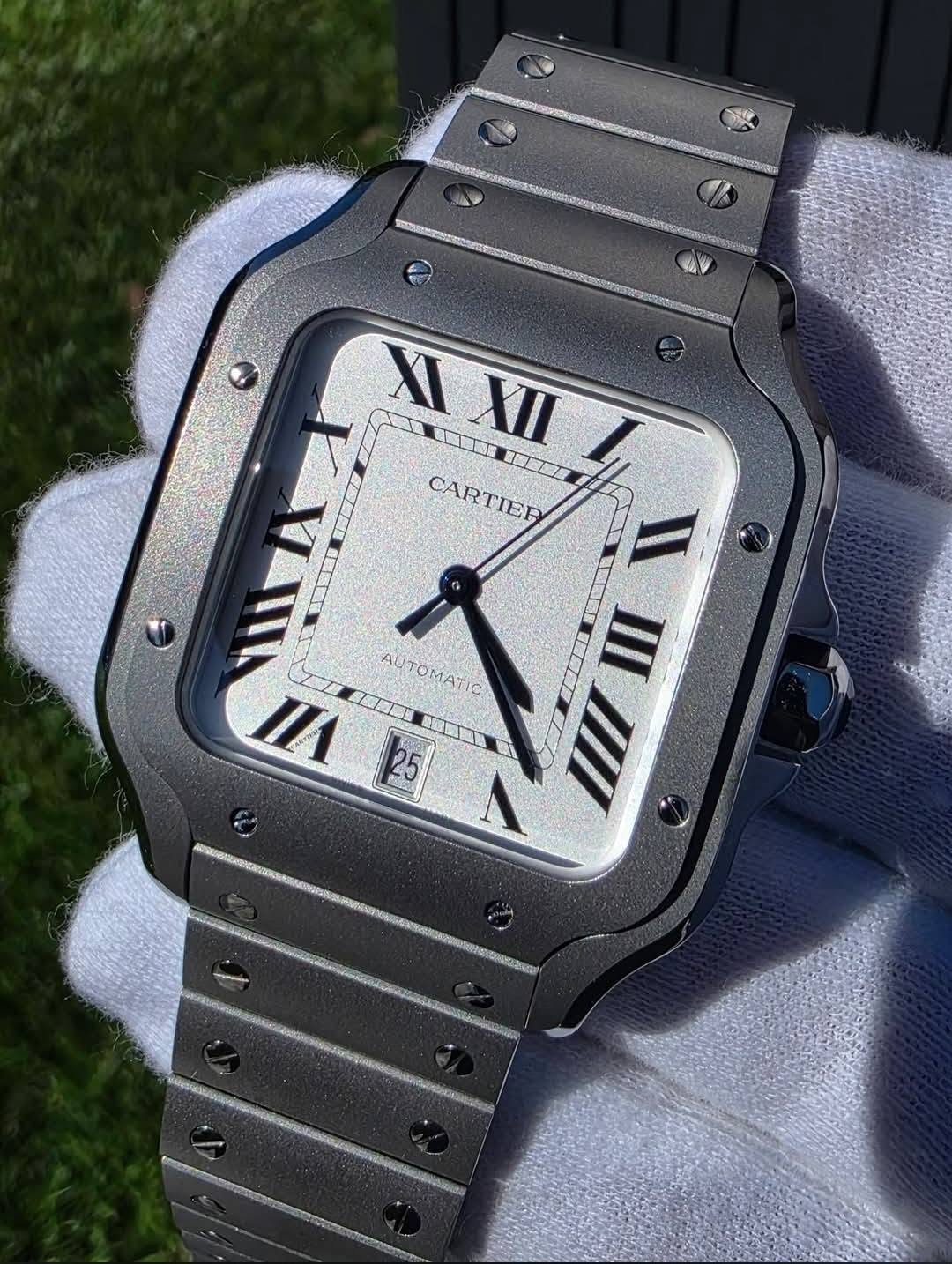 May be an image of wrist watch and text