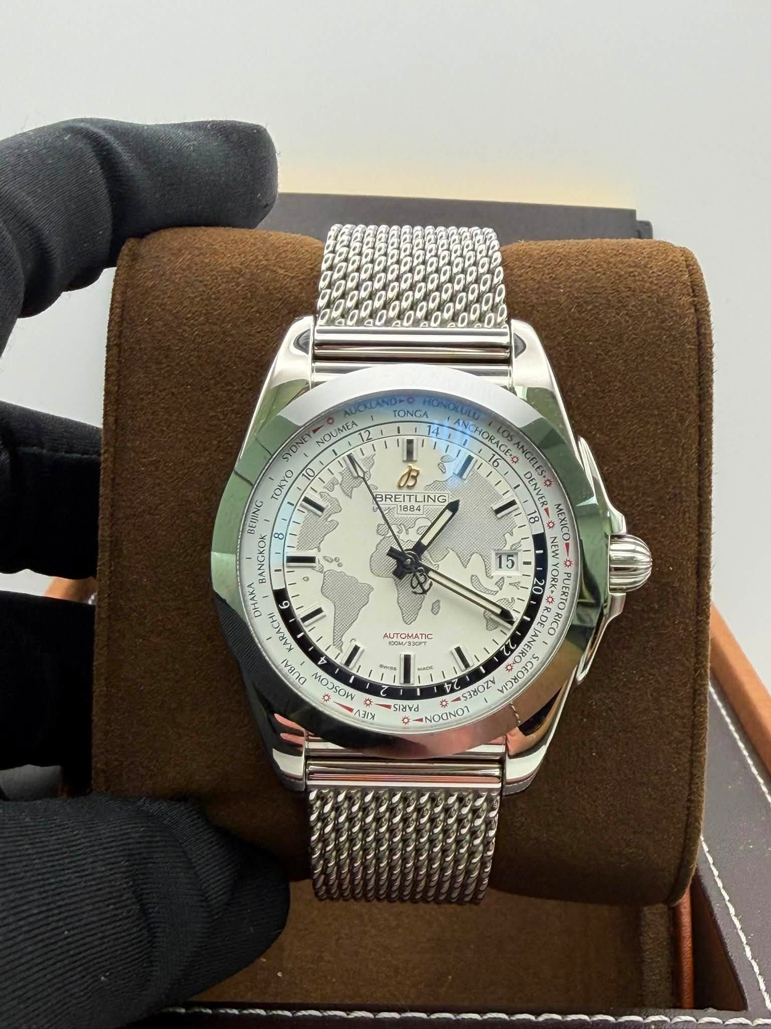 May be an image of wrist watch and text that says 'TONGA 14 14 ANG ORAGE-O ORAGEO 14 ANCHORAGE. DENVERA MEXI NEW お BREI BREITLING EITL LING 1884 08 NOUMEA 12 YON TOKYO BEJING…