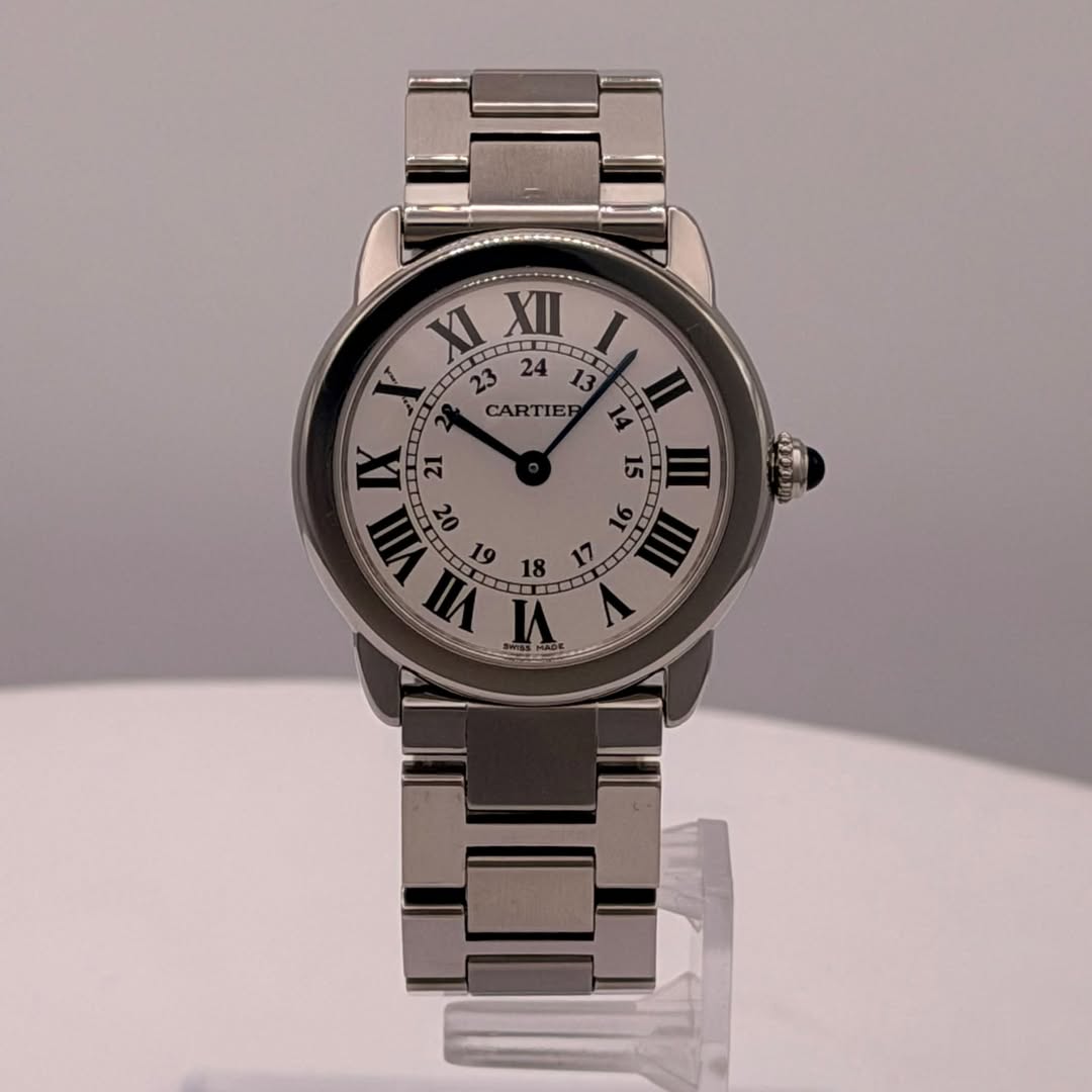 May be an image of wrist watch and text that says 'XI III XII T ETIO L V CARTIEF CAR 1g 4 21 15 VIIII 22 10 III 19 18 R 11 VII VI V'