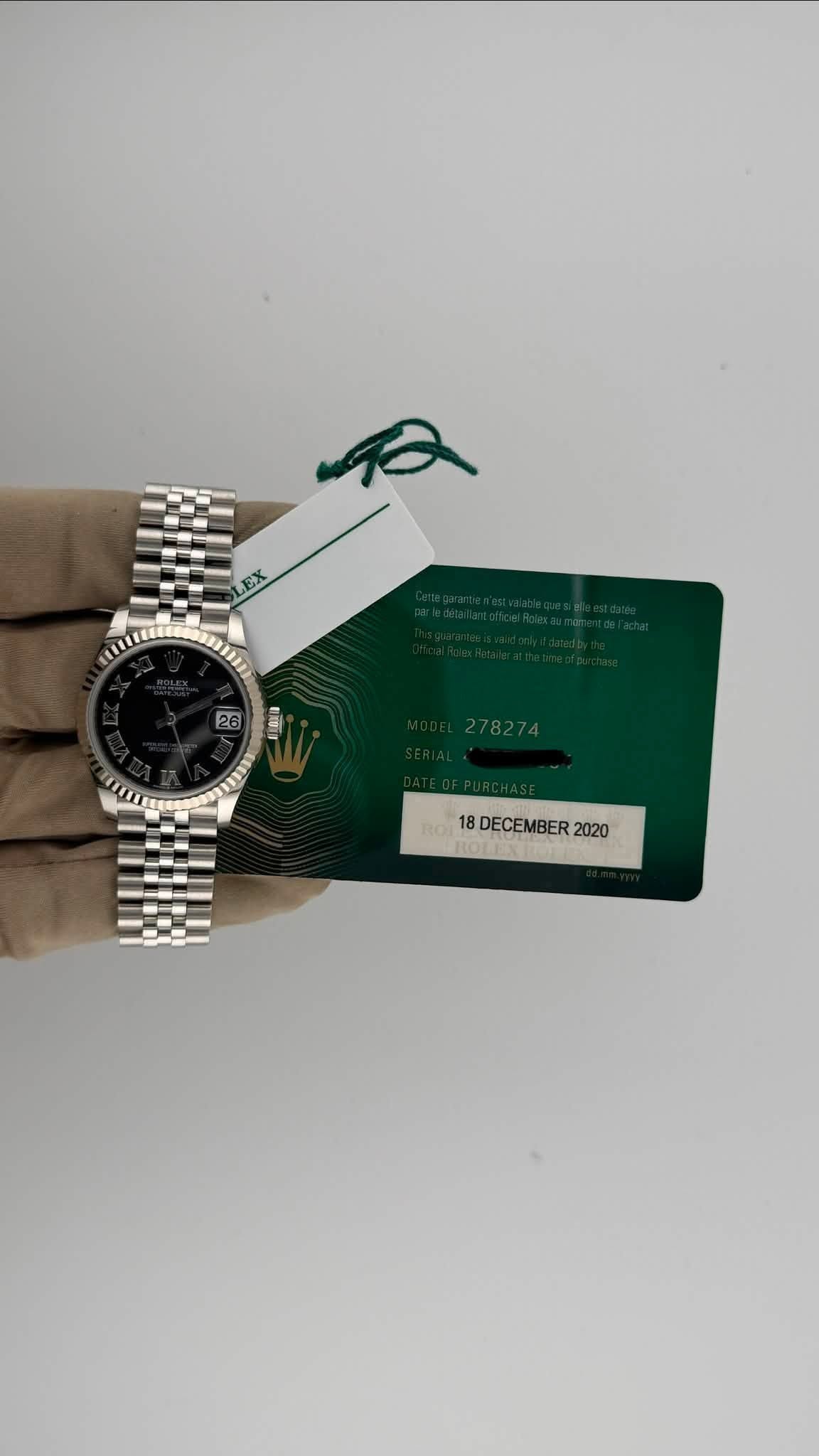 May be an image of wrist watch, money and text that says 'LEX 26 AIDYM 278274 8DECEMBER2020 18 DECEMBER: 2020'