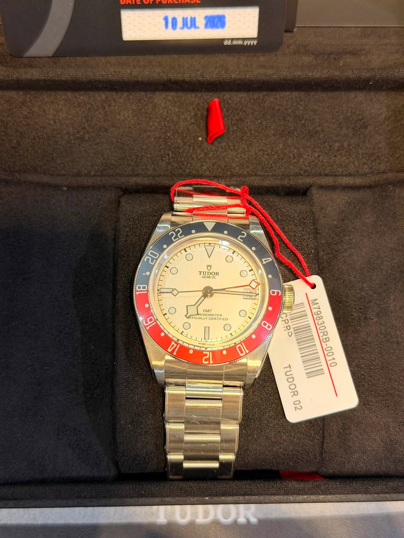 May be an image of wrist watch and text that says '10JUL 10J ඒக්. Wtult PAVY O 22 20 b 18 2 T O 円 TUDOR TUDOR 4 C 6 OOBETEH CMT KCRYT 16 O CpoO M79830RB-0010 B-0010 TUDOR 02'