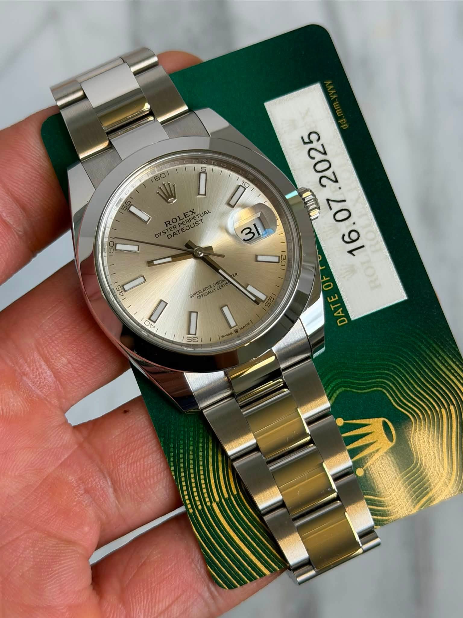 May be an image of wrist watch and text that says '60 10 10 EATUAL JAL 0 UST 오2 0 ROT 10 Ob OV PERLATIVEC OFFICIALLY n SE D'