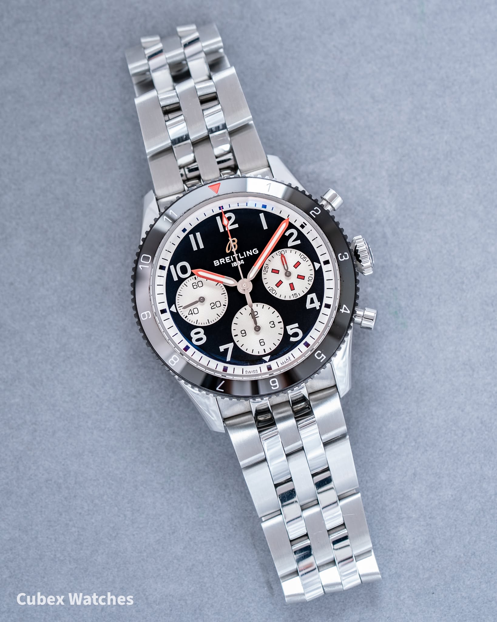 May be an image of wrist watch and text