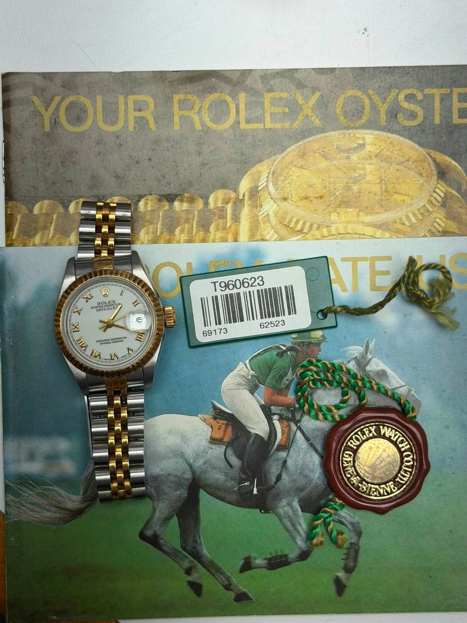 May be an image of wrist watch and text
