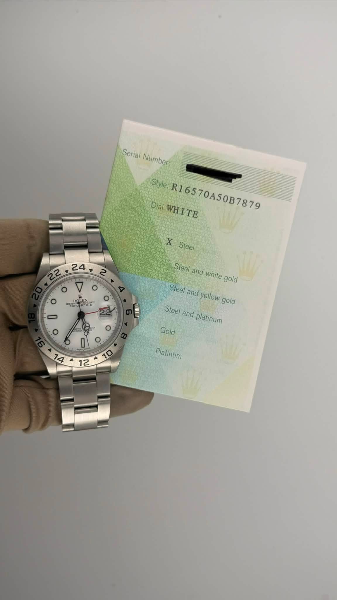 May be an image of wrist watch and text that says 'SerialNumbert Serial Number: Style R16570A50B7879 Dial WH WHITE X Steel ဝ Steel and white gold דמחחע EOPE EE - o Steel and…