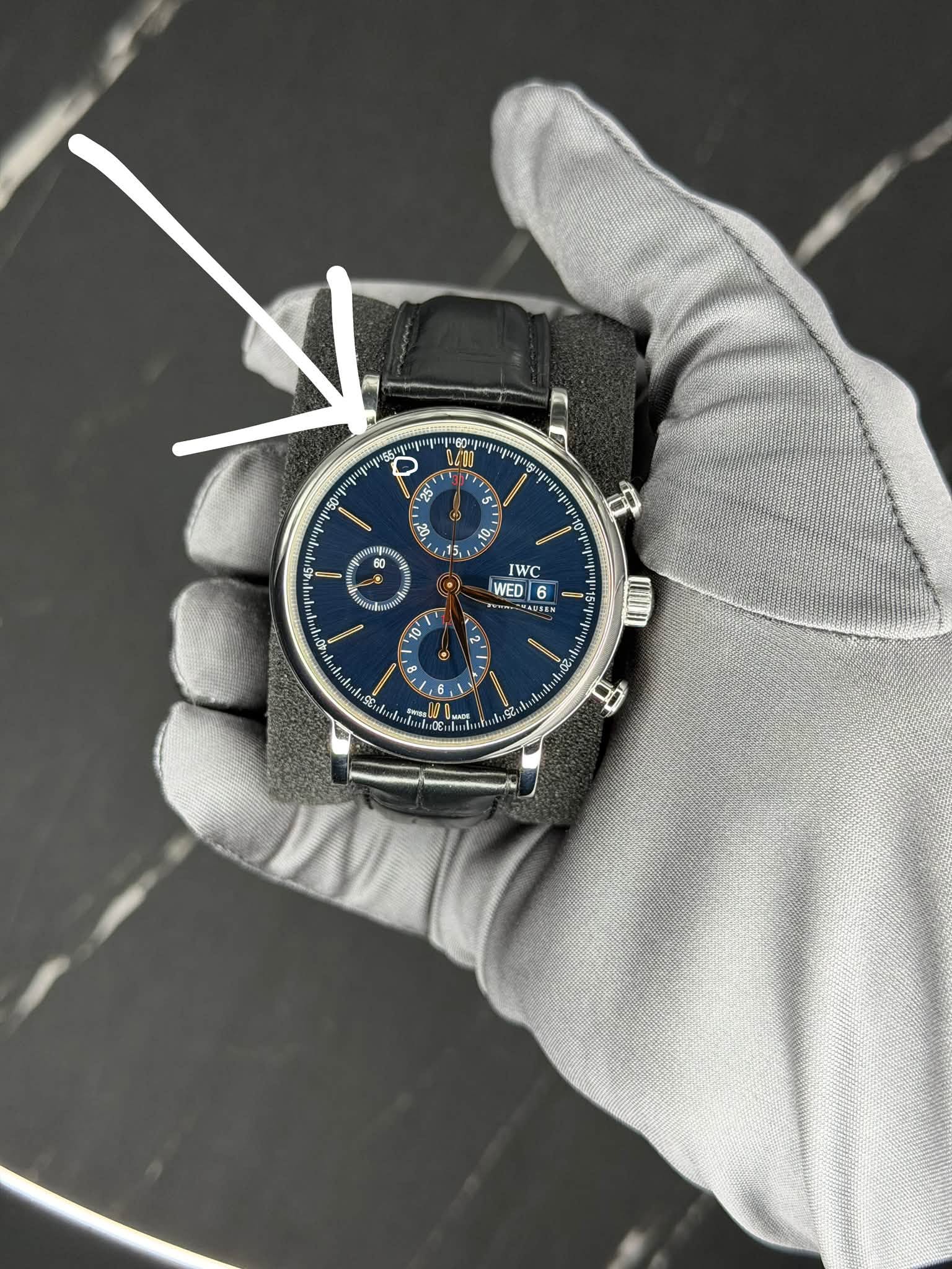 May be an image of wrist watch and text