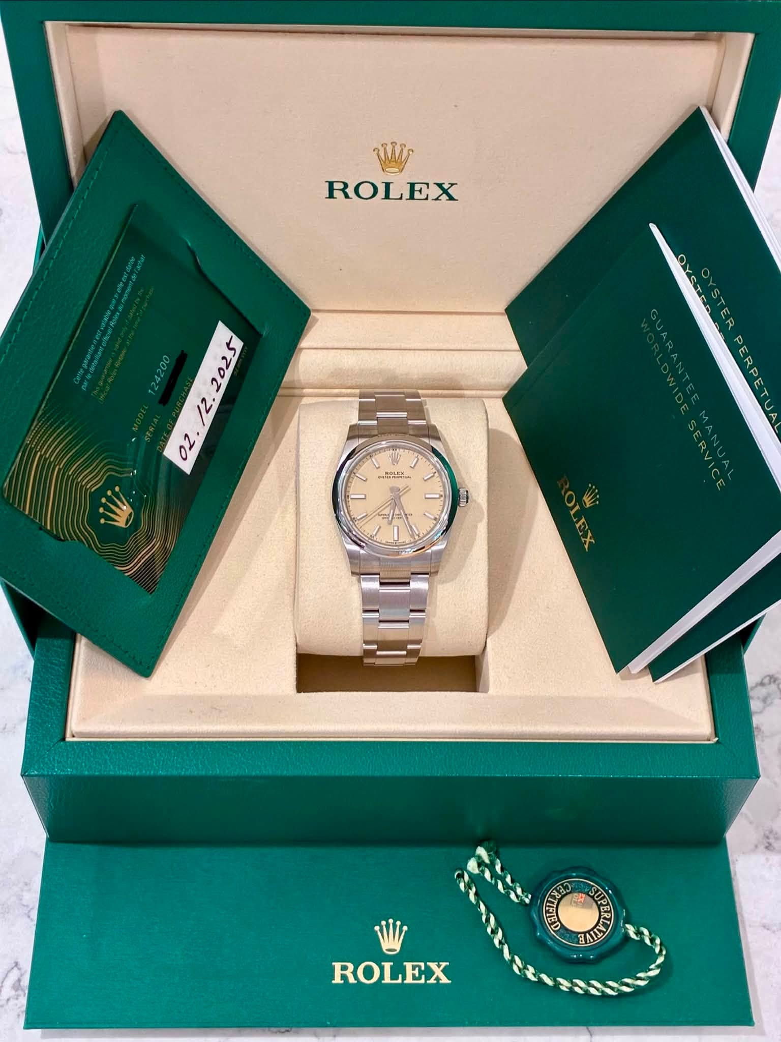 May be an image of wrist watch and text that says 'ROLEX 02./ . う M5 سمی BAL ROLEX'
